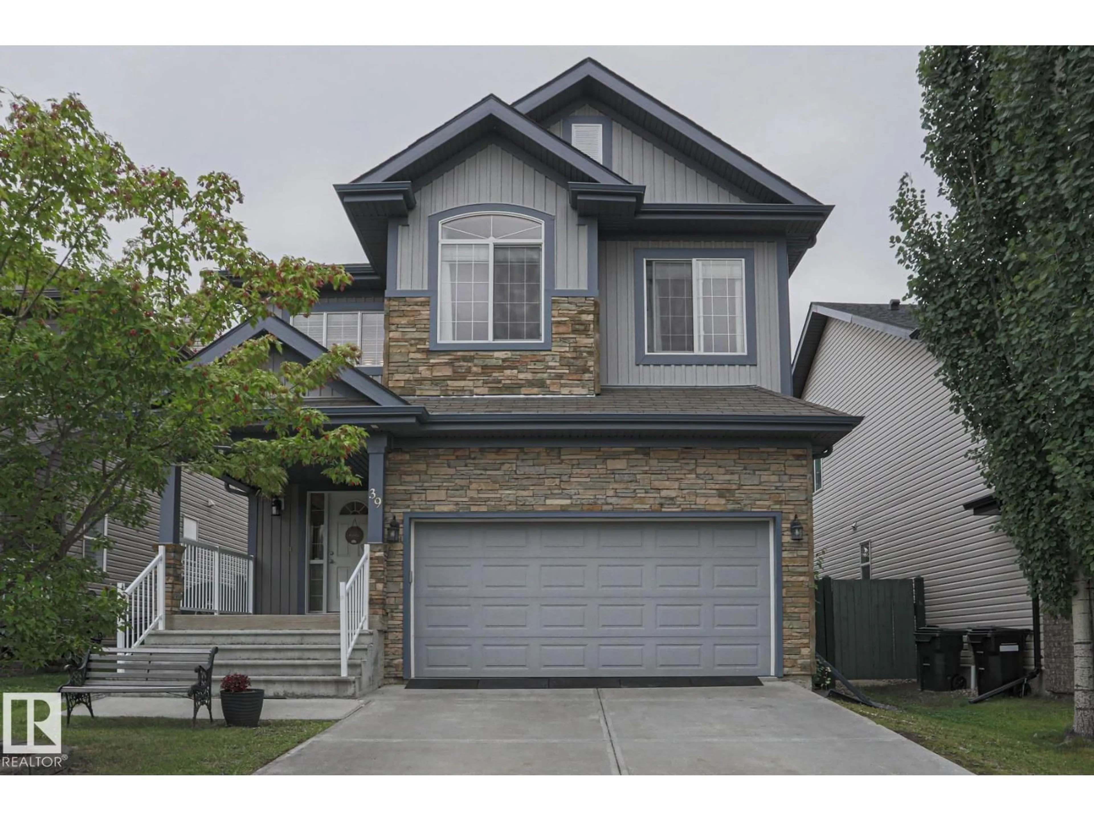 Home with vinyl exterior material, street for 39 VIVIAN WY, Spruce Grove Alberta T7X0C2