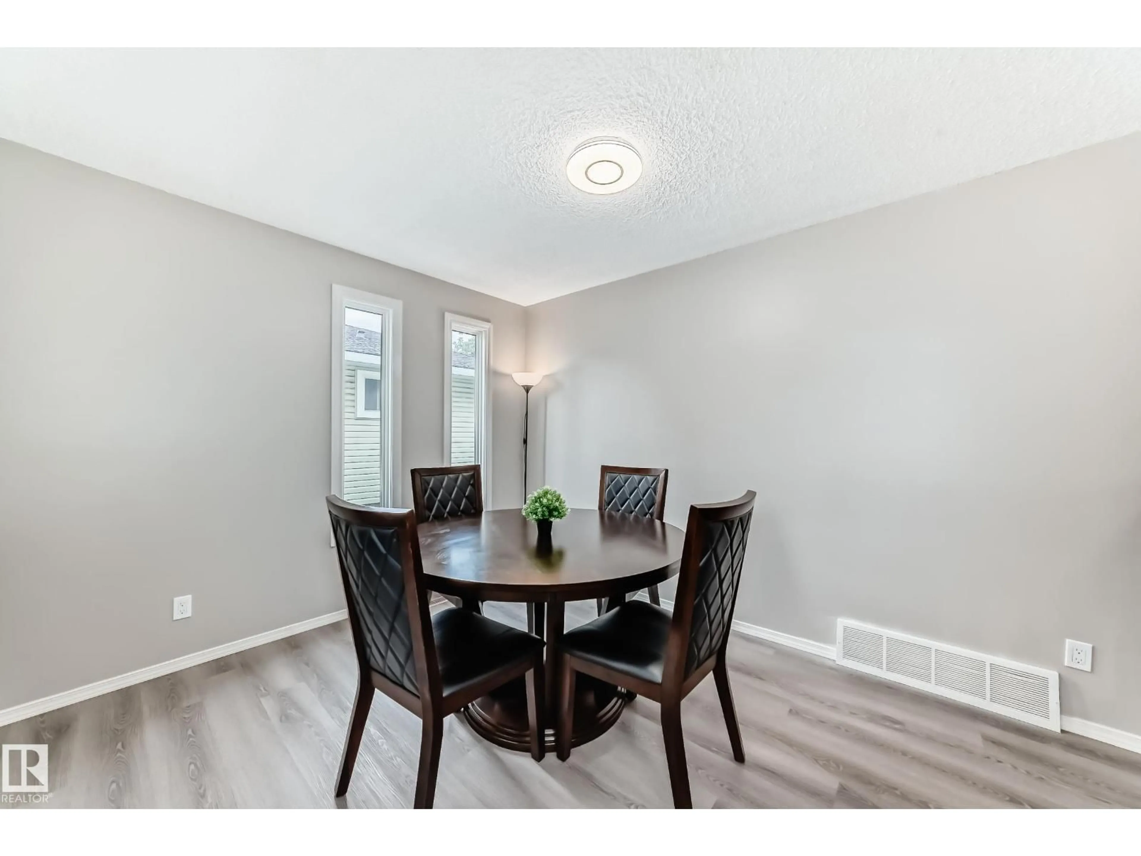 Dining room, wood/laminate floor for NW - 1851 104 ST, Edmonton Alberta T6J5J9