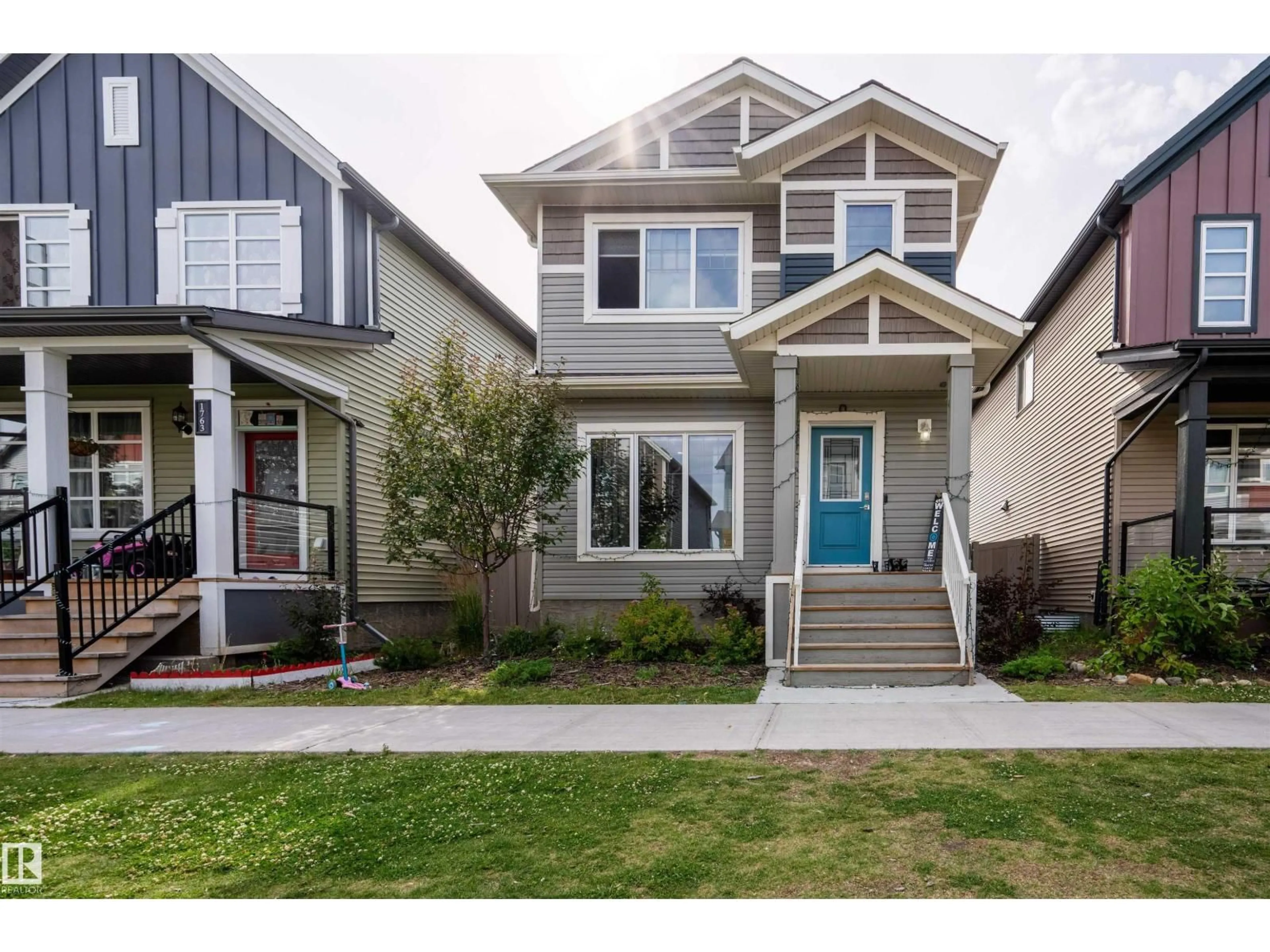 Home with vinyl exterior material, street for NW - 1767 26A ST, Edmonton Alberta T6T2H8