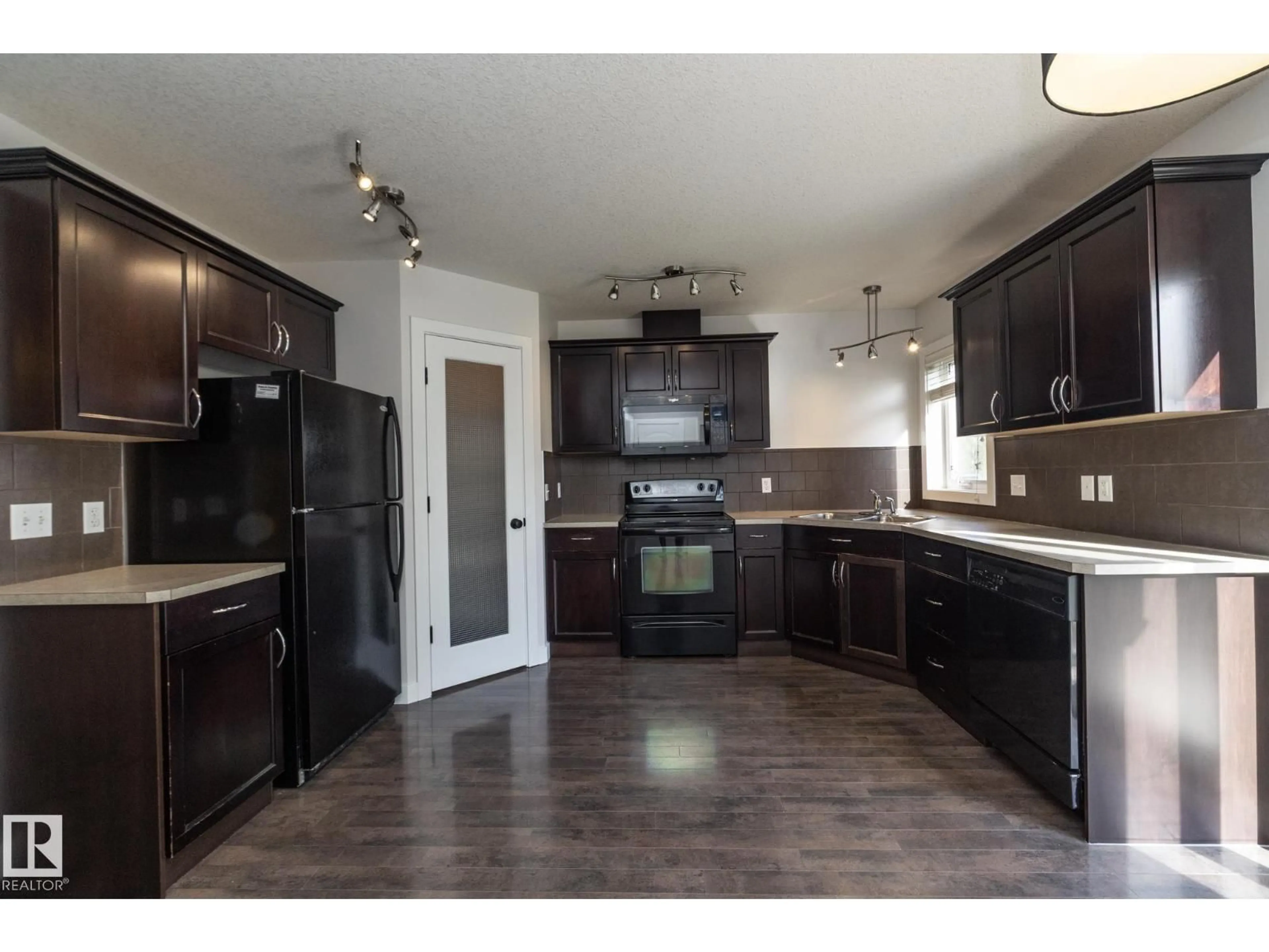 Open concept kitchen, unknown for 193 BIRCHWOOD CL, Devon Alberta T9G0A5