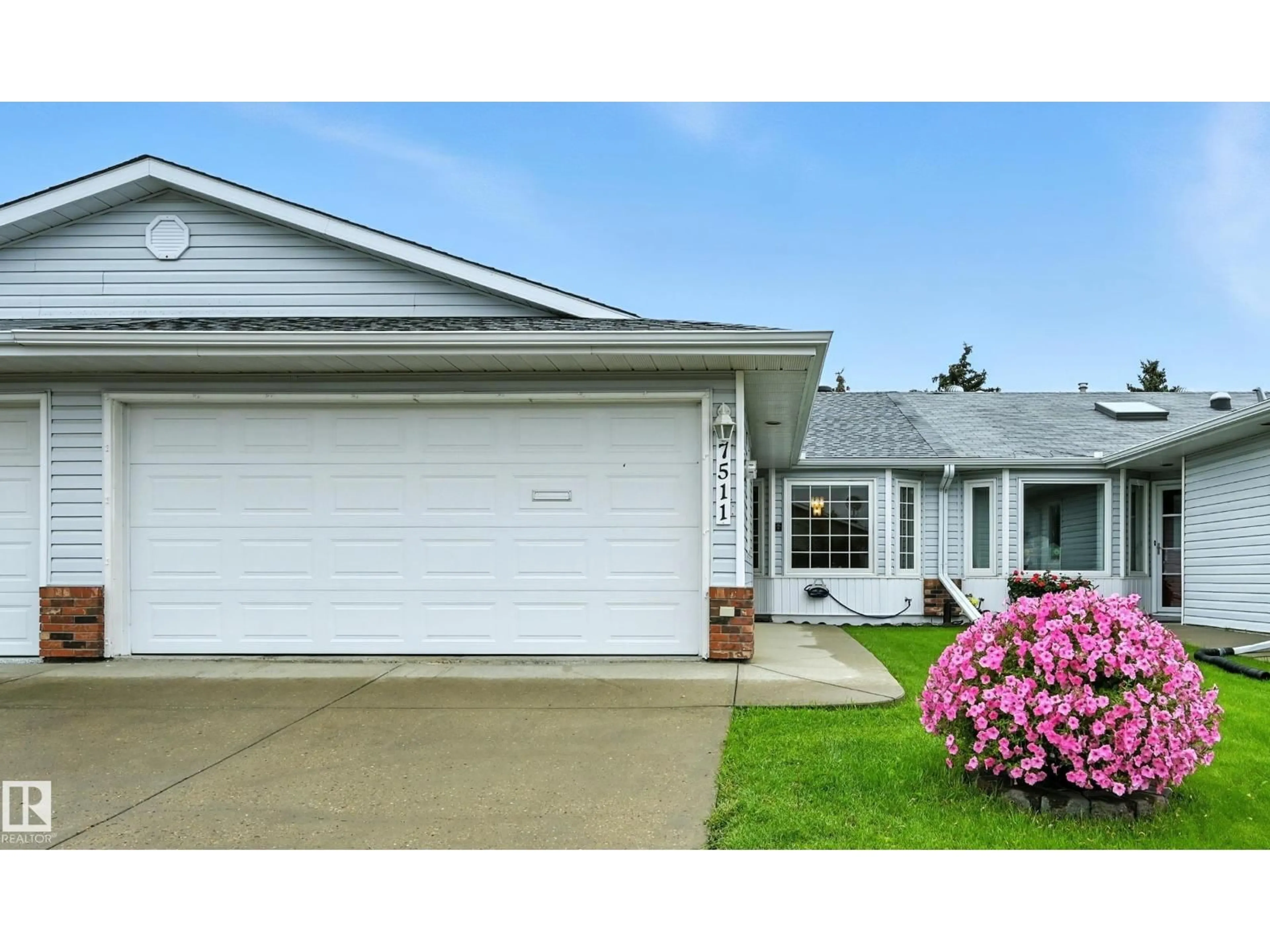 Home with vinyl exterior material, street for 7511 137A AV NW, Edmonton Alberta T5C3R4