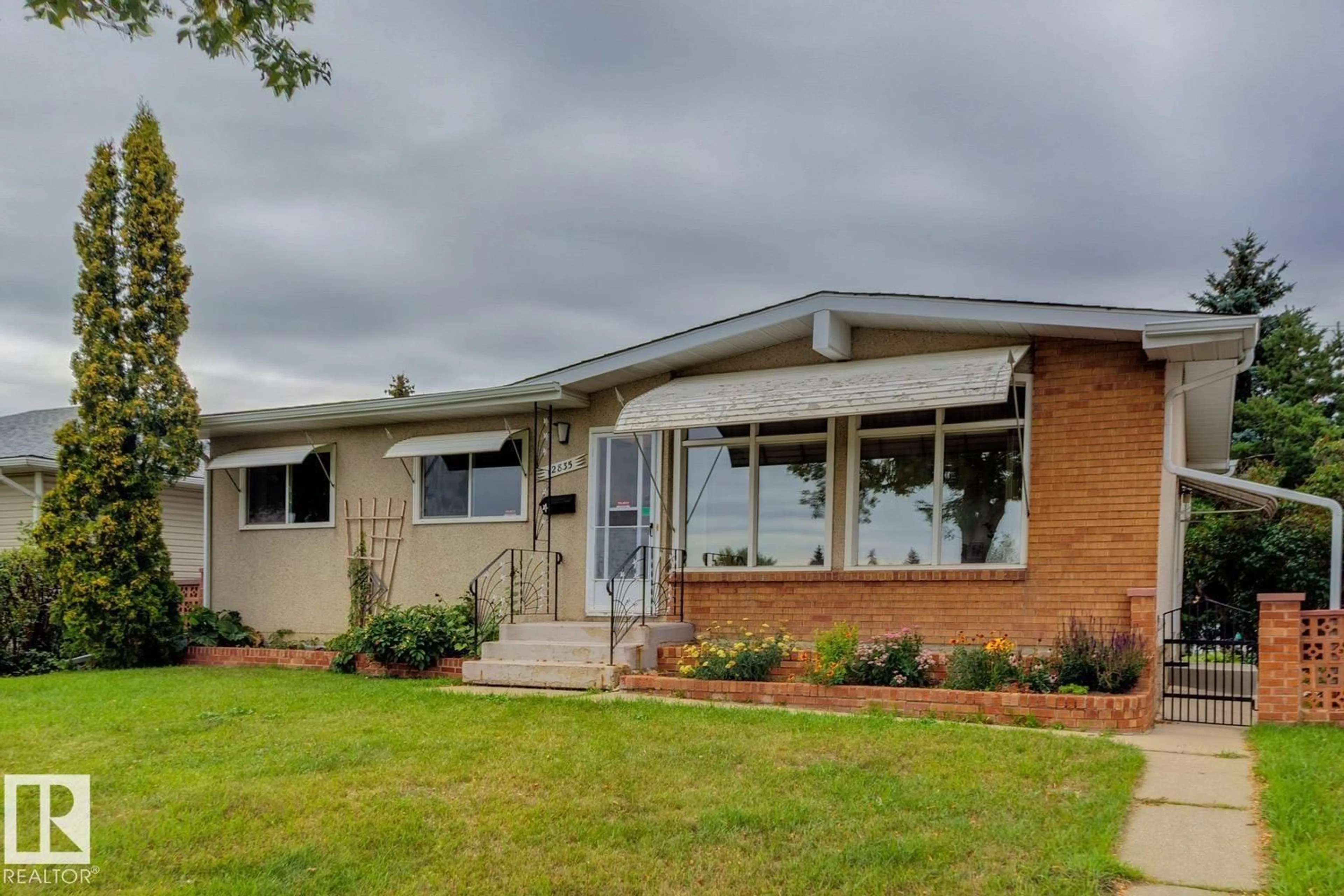 Home with brick exterior material, unknown for NW - 12835 91 ST, Edmonton Alberta T5E3P4