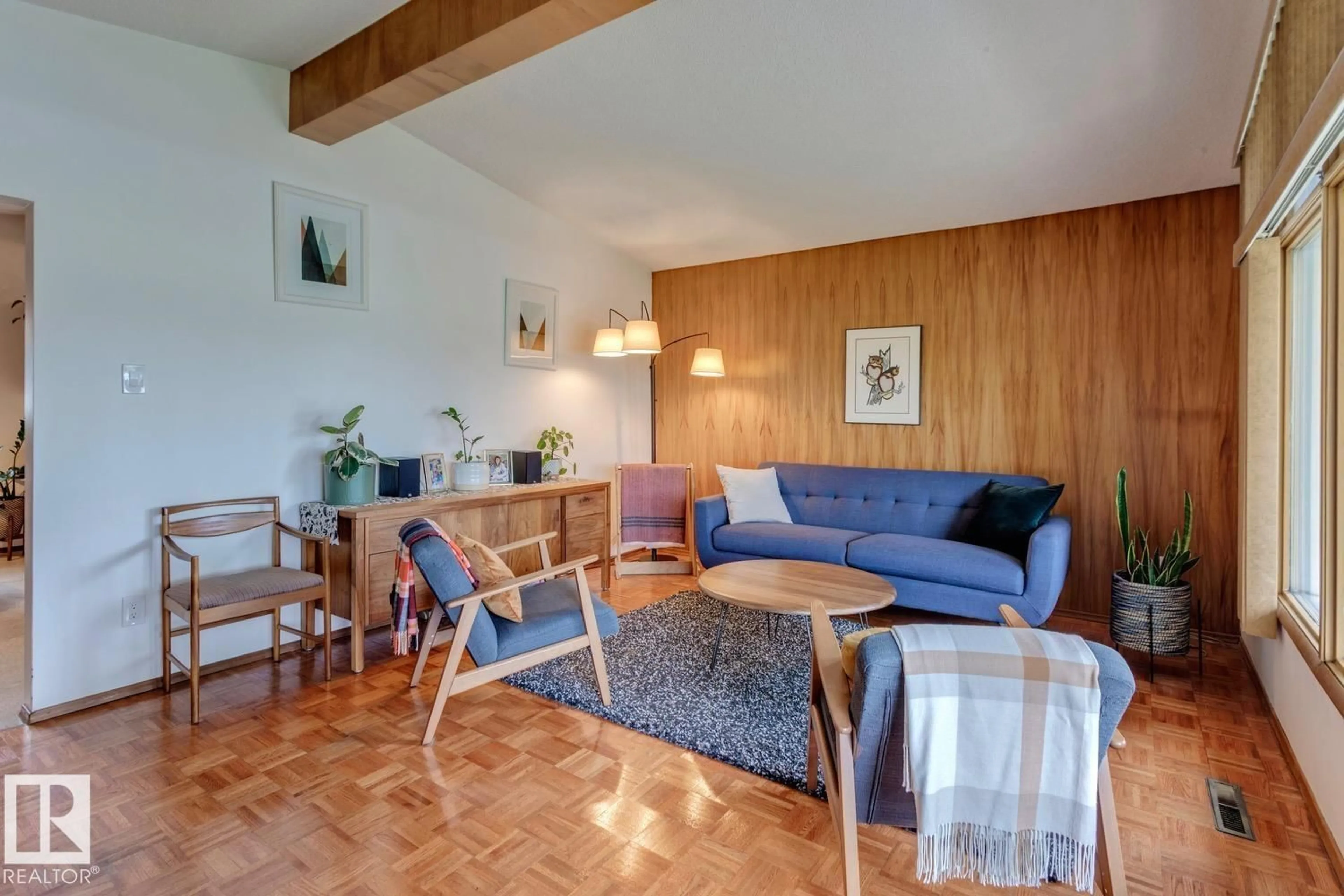 Living room with furniture, wood/laminate floor for NW - 12835 91 ST, Edmonton Alberta T5E3P4