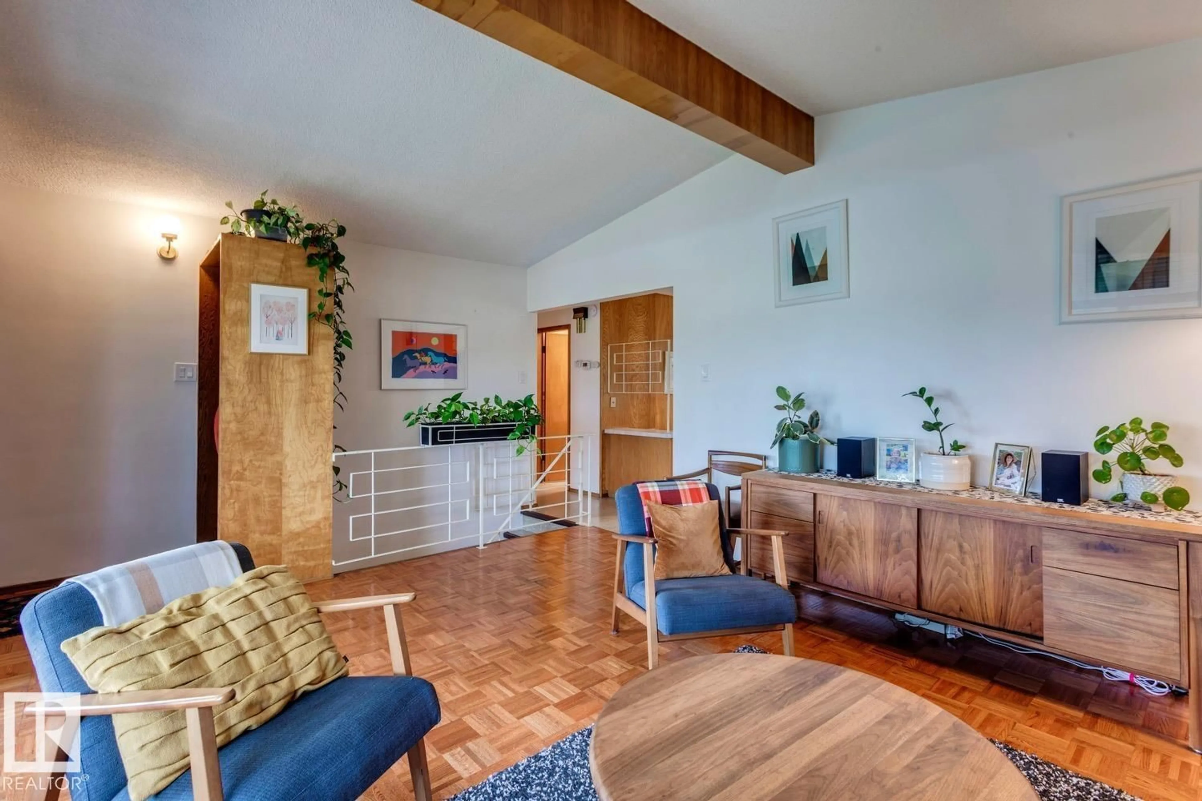 Living room with furniture, wood/laminate floor for NW - 12835 91 ST, Edmonton Alberta T5E3P4