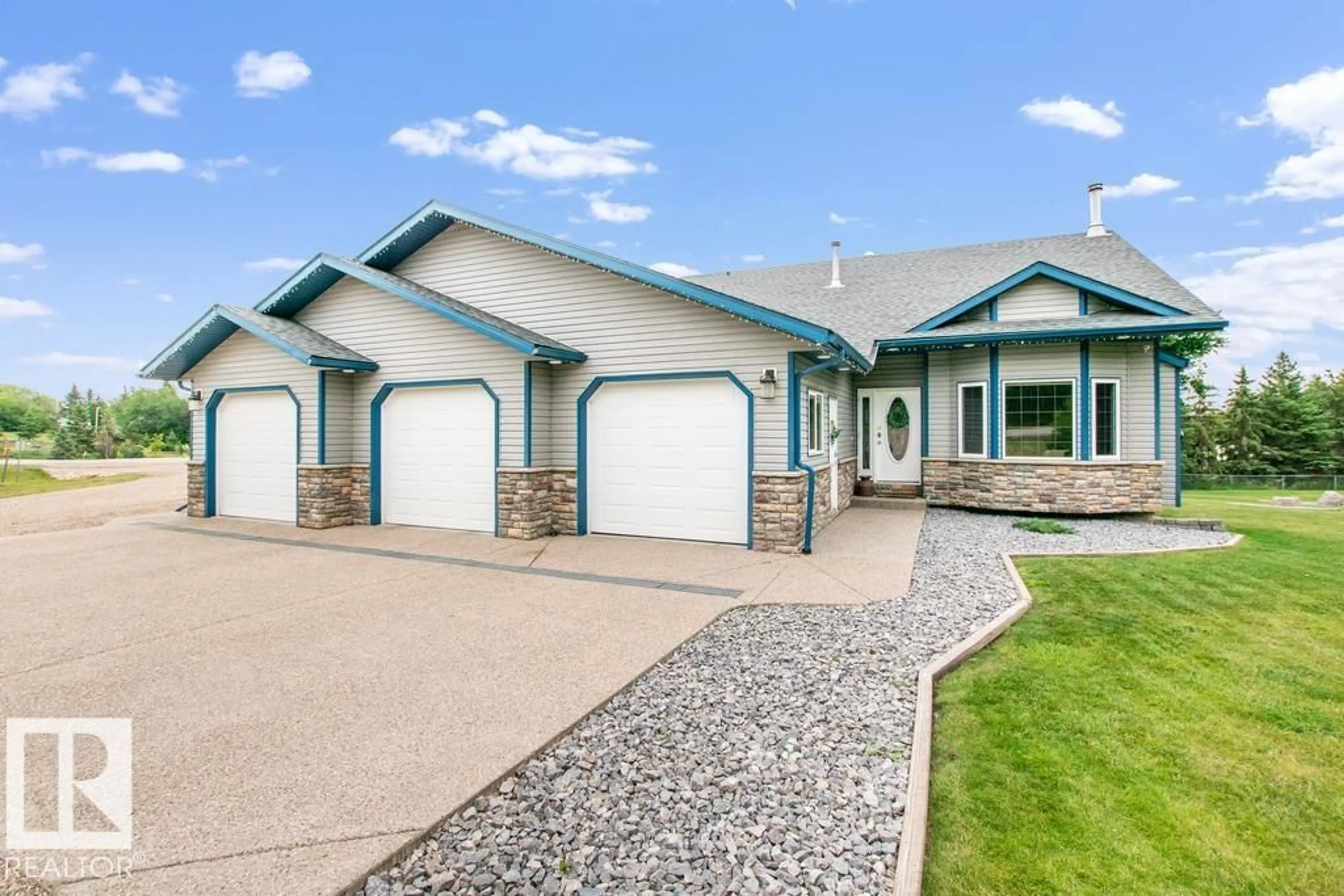 Home with vinyl exterior material, street for 61314 - 505 RGE RD 463, Rural Bonnyville M.D. Alberta T9N2J6