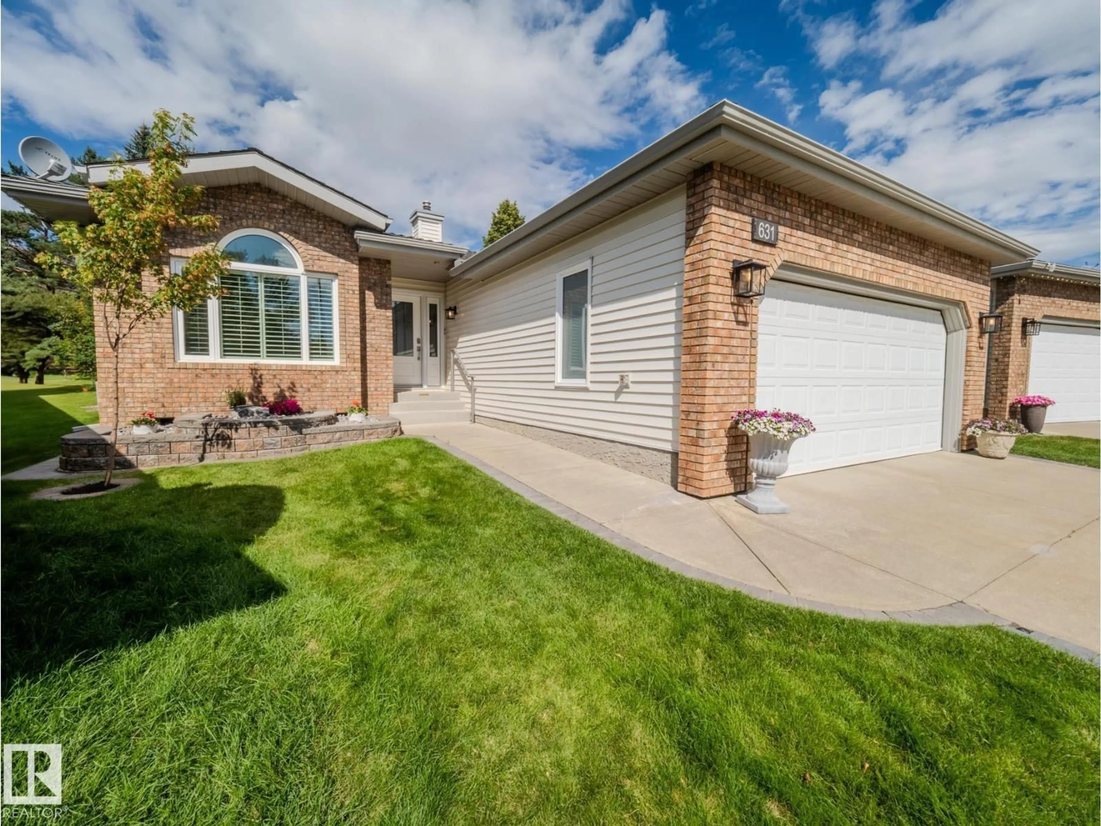 Home with vinyl exterior material, street for 631 REVELL WD, Edmonton Alberta T6R2H9