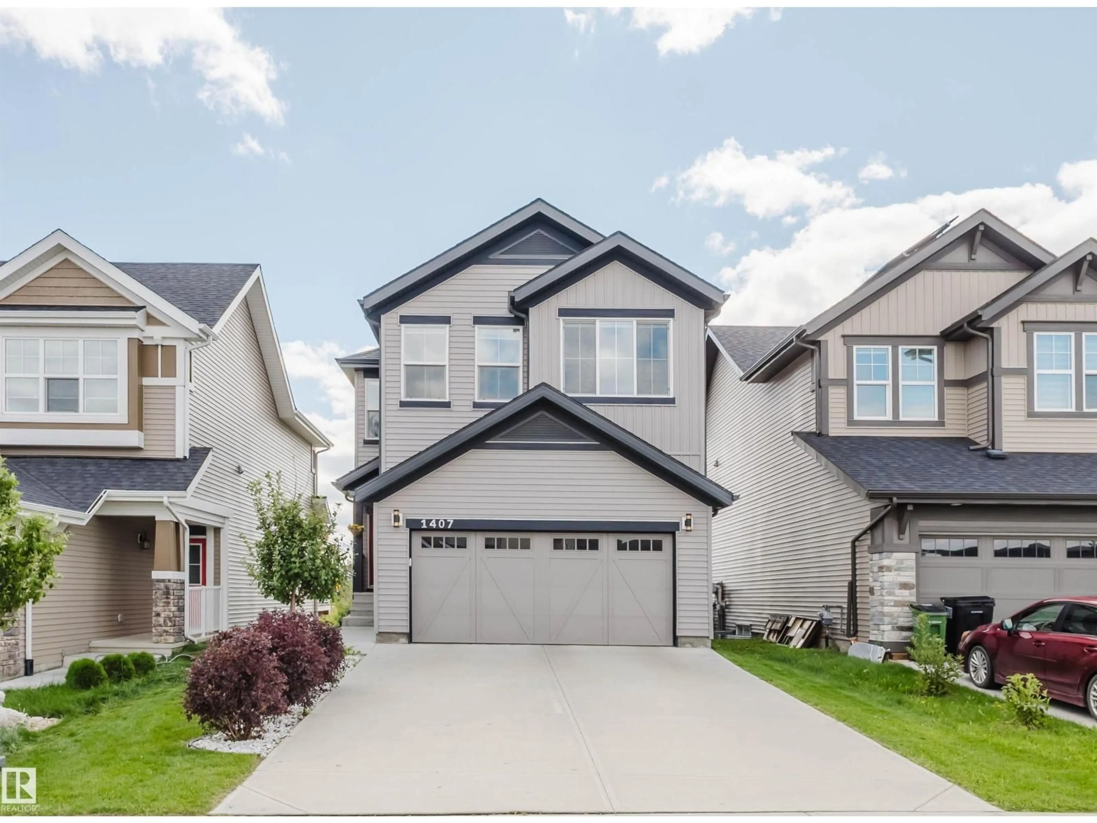 Home with vinyl exterior material, street for SW - 1407 DARBY GREEN GR, Edmonton Alberta T6W4N4