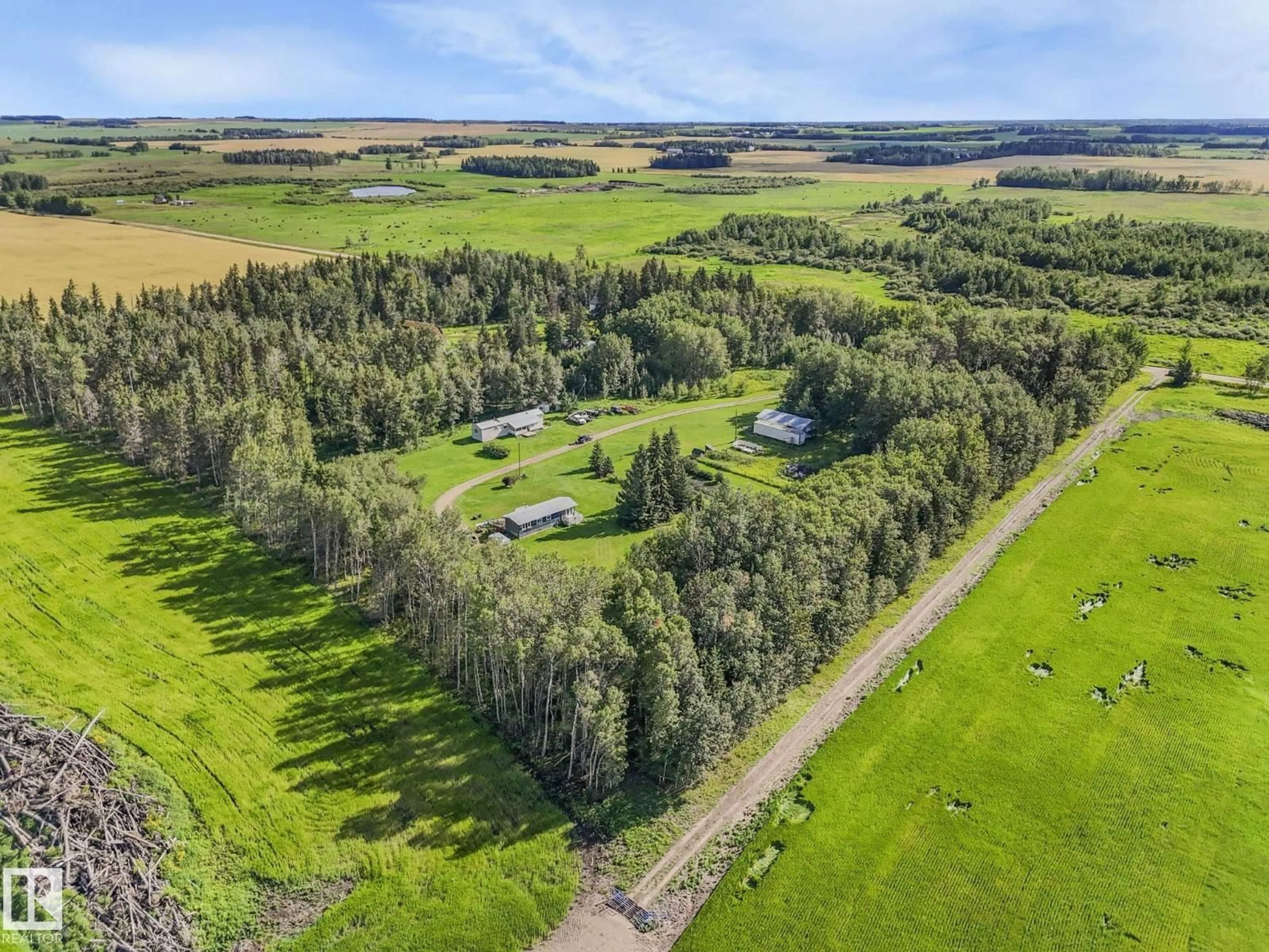 A pic from outside/outdoor area/front of a property/back of a property/a pic from drone, forest/trees view for 452068A RGE ROAD 275, Rural Wetaskiwin County Alberta T0C0V0