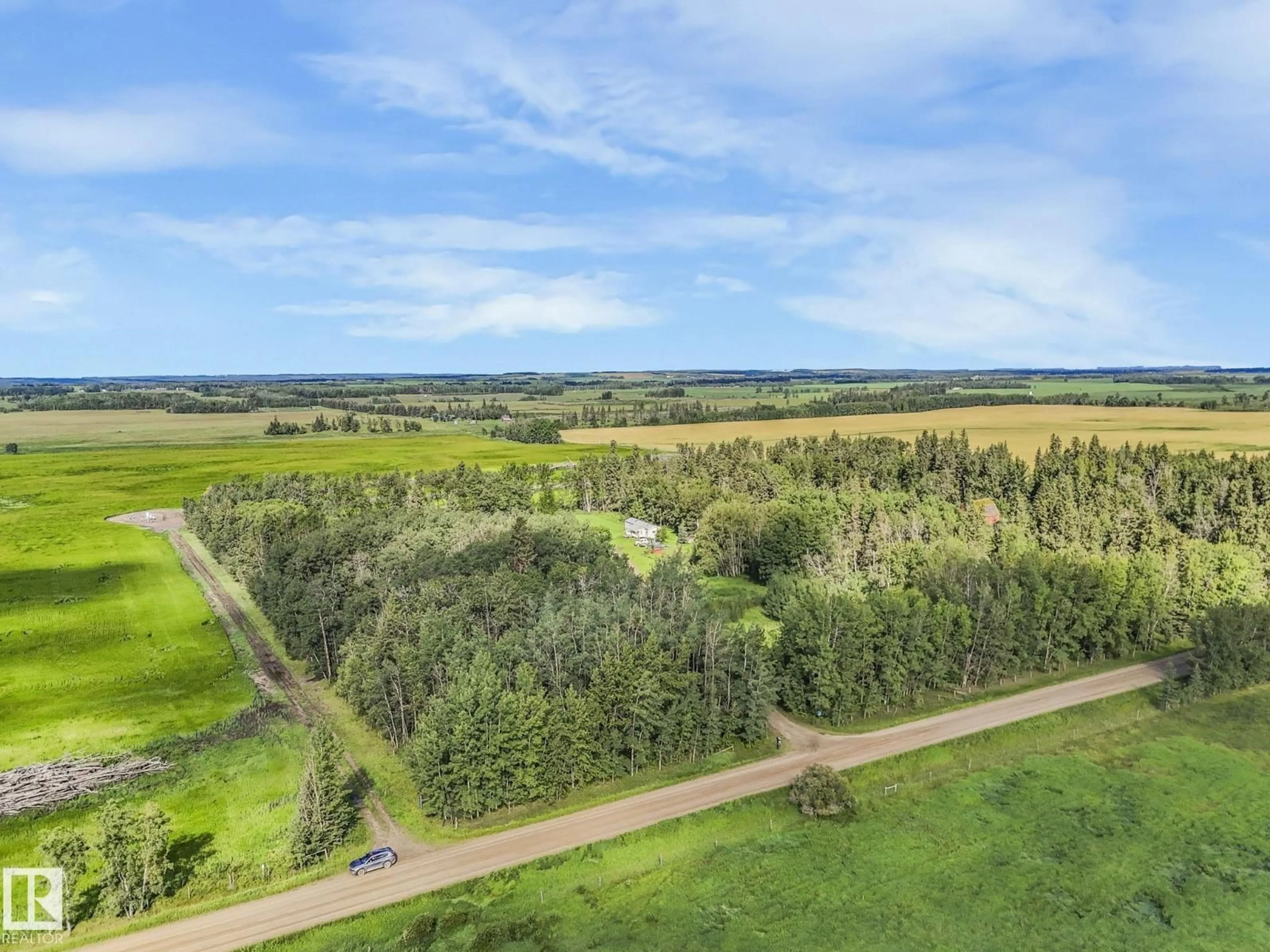 A pic from outside/outdoor area/front of a property/back of a property/a pic from drone, forest/trees view for 452068A RGE ROAD 275, Rural Wetaskiwin County Alberta T0C0V0