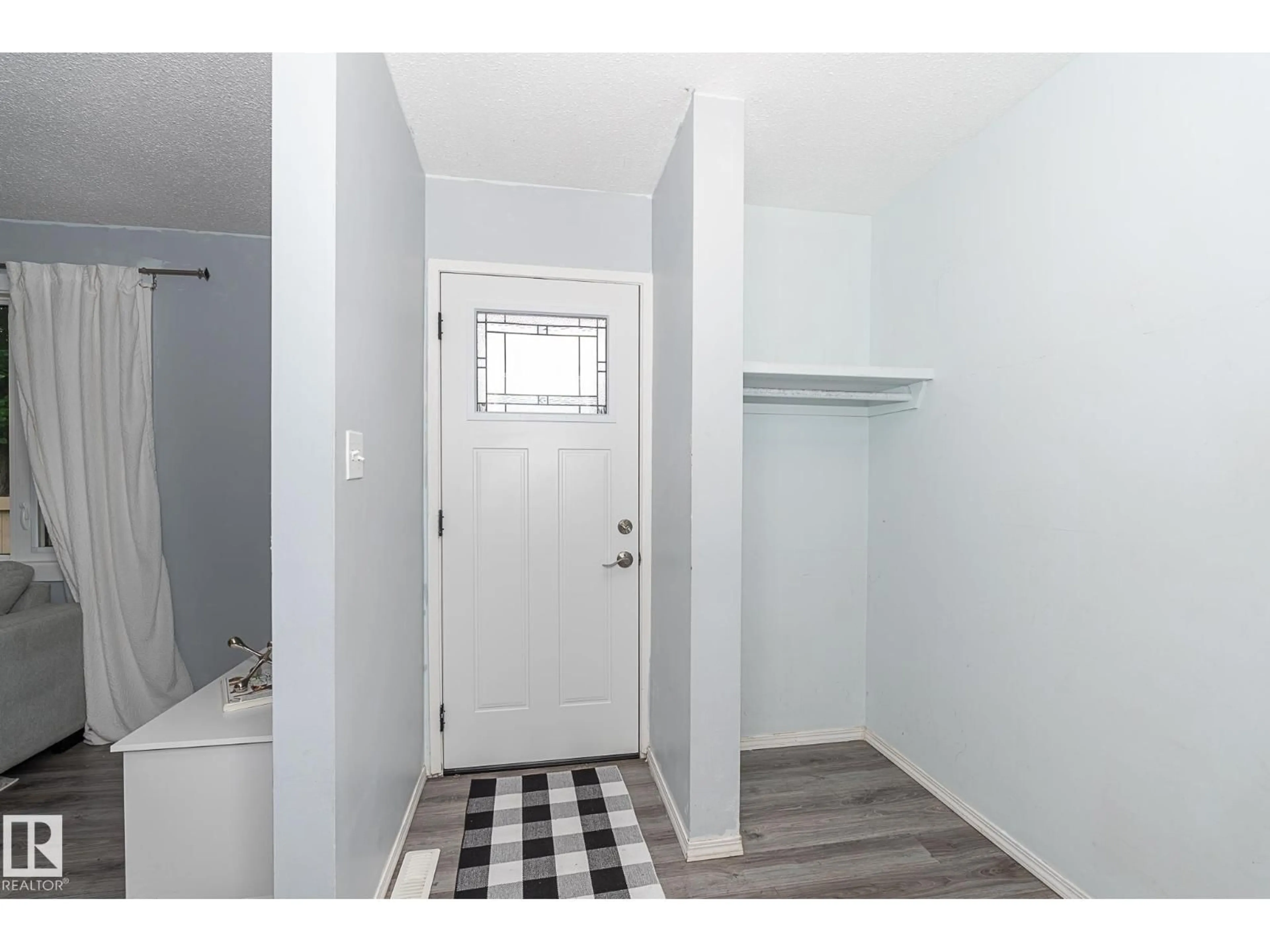 Indoor entryway for #4 - 8010 141 AV, Edmonton Alberta T5C2N9