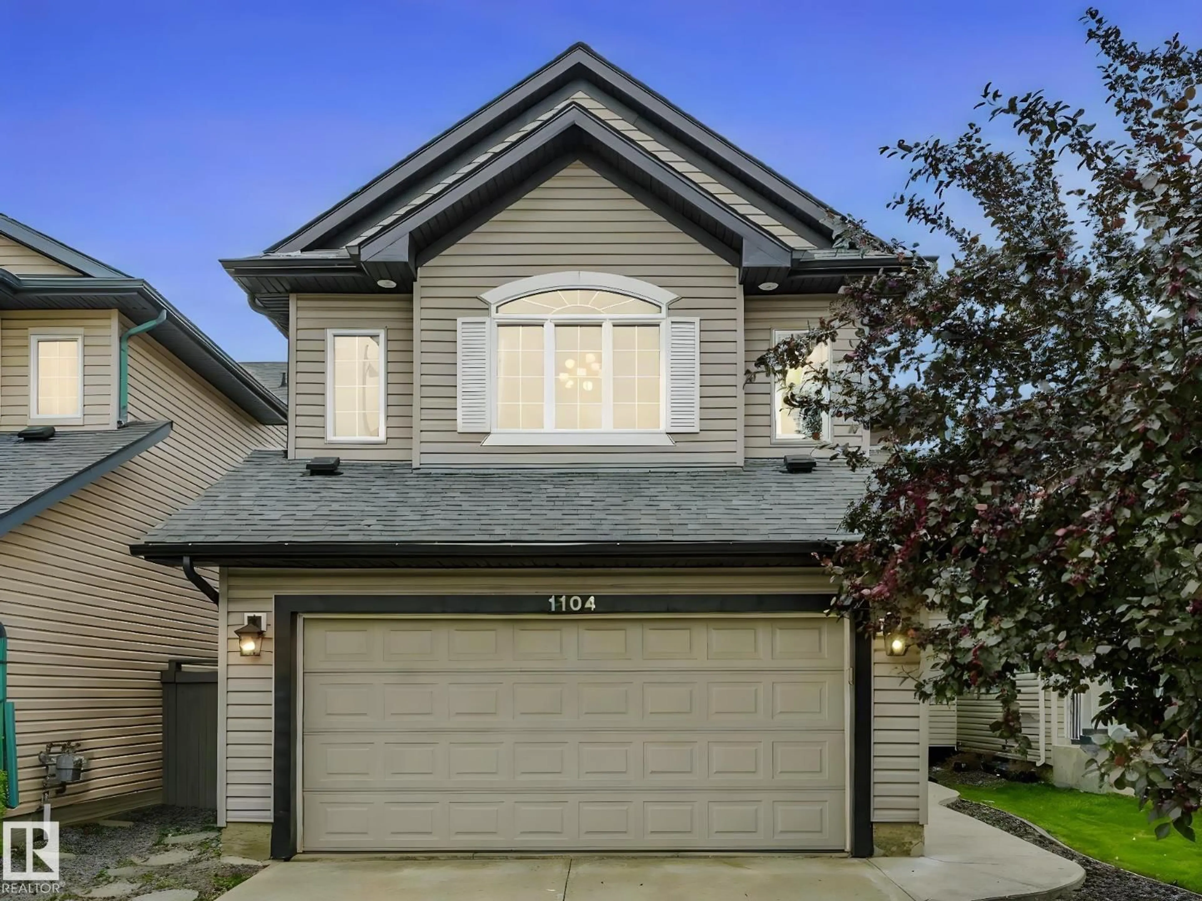 Home with vinyl exterior material, street for SW - 1104 118A ST, Edmonton Alberta T6W0B8