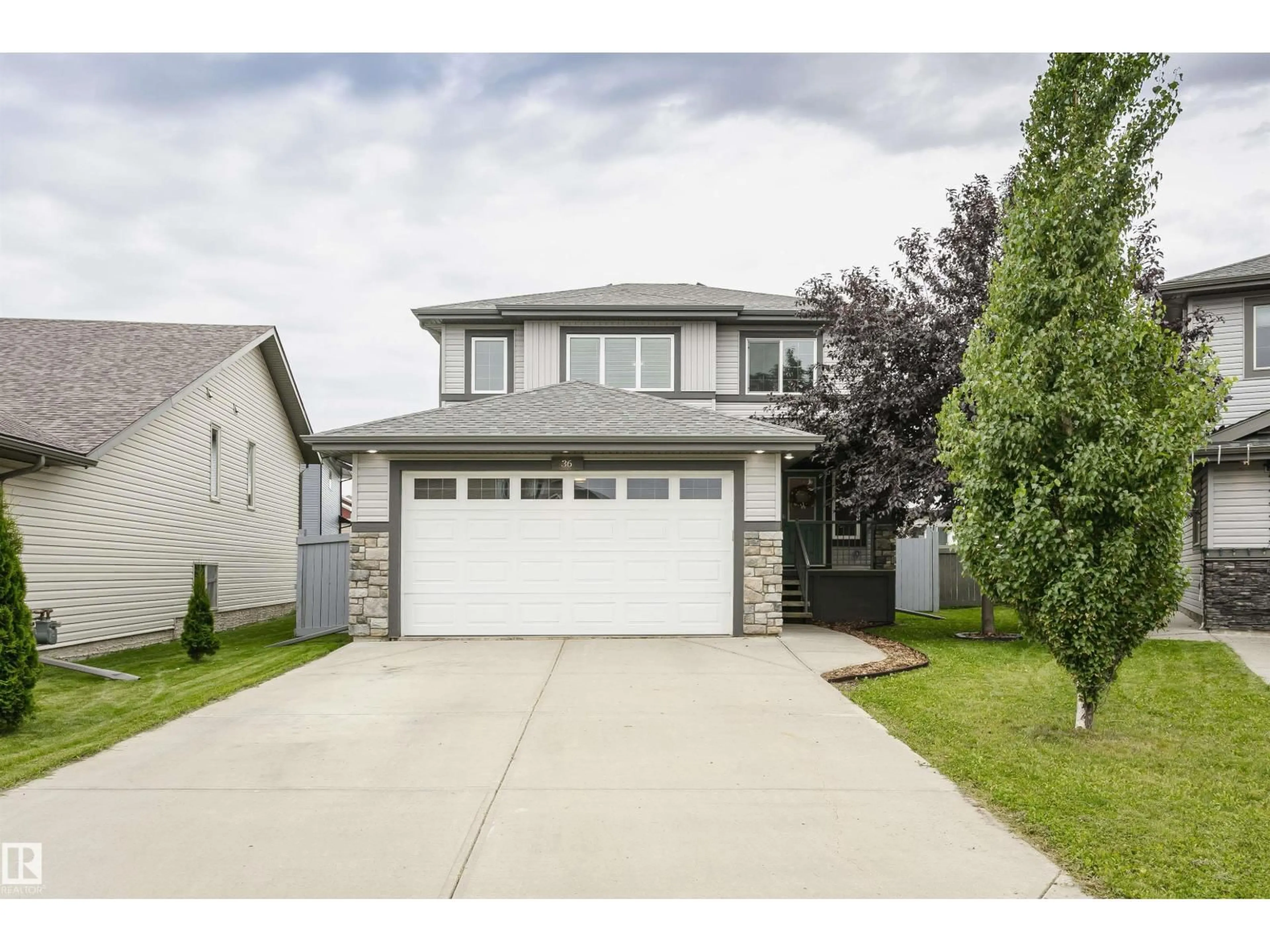 Home with vinyl exterior material, street for 36 SOUTHBRIDGE DR, Calmar Alberta T0C0V0