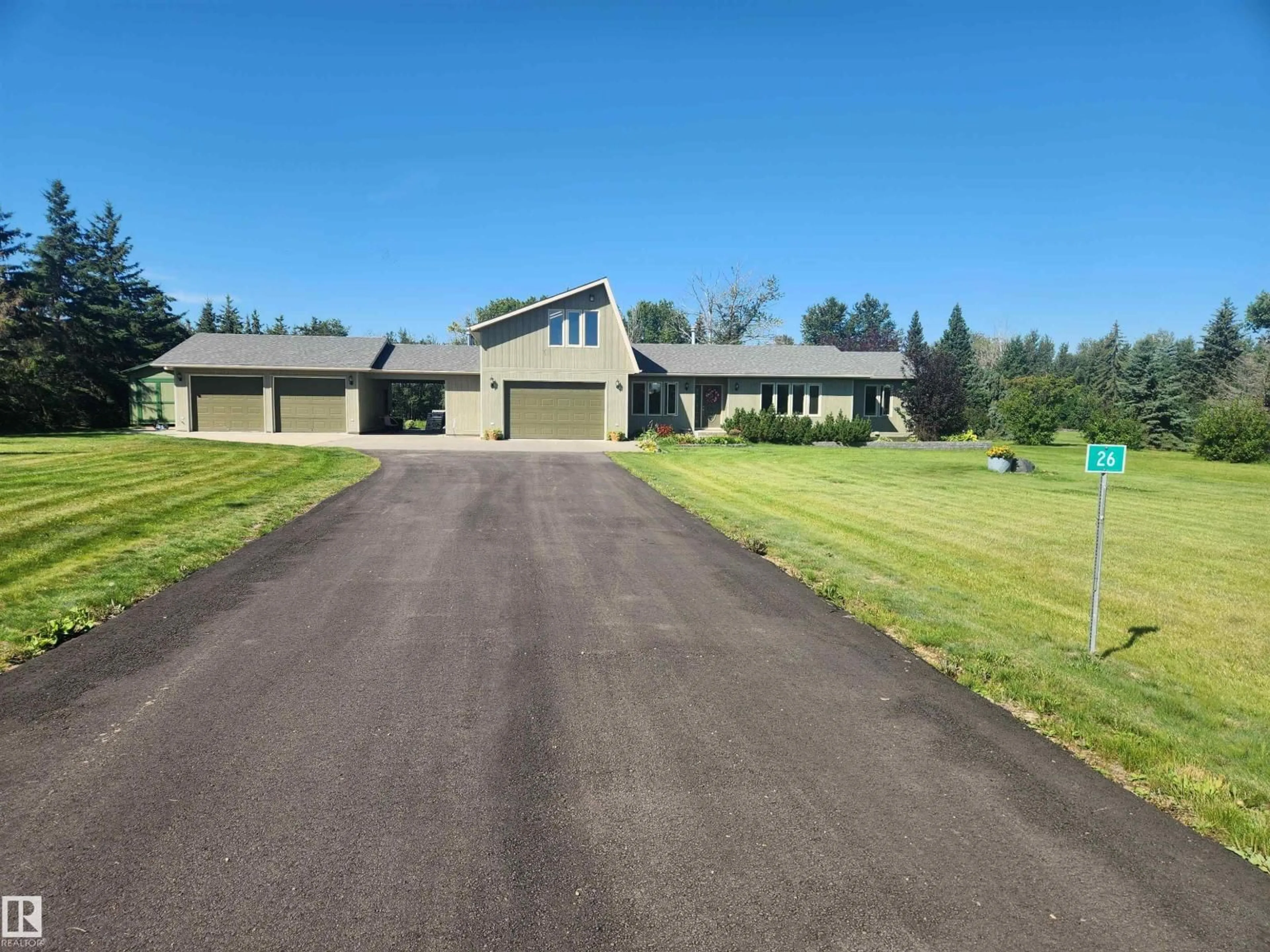 A pic from outside/outdoor area/front of a property/back of a property/a pic from drone, street for 26 - 27118 HWY 18, Rural Westlock County Alberta T7P2P5