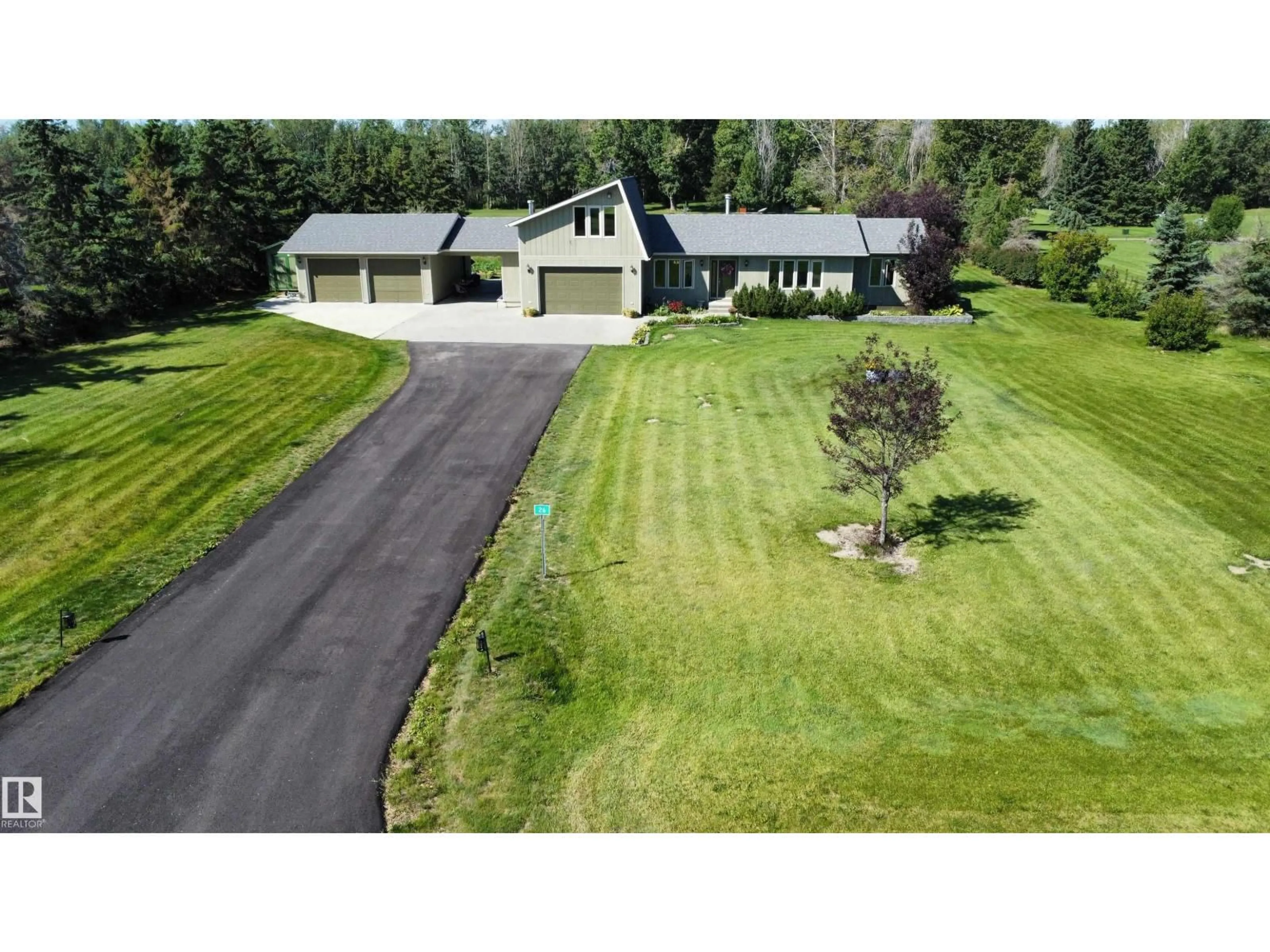 A pic from outside/outdoor area/front of a property/back of a property/a pic from drone, unknown for 26 - 27118 HWY 18, Rural Westlock County Alberta T7P2P5