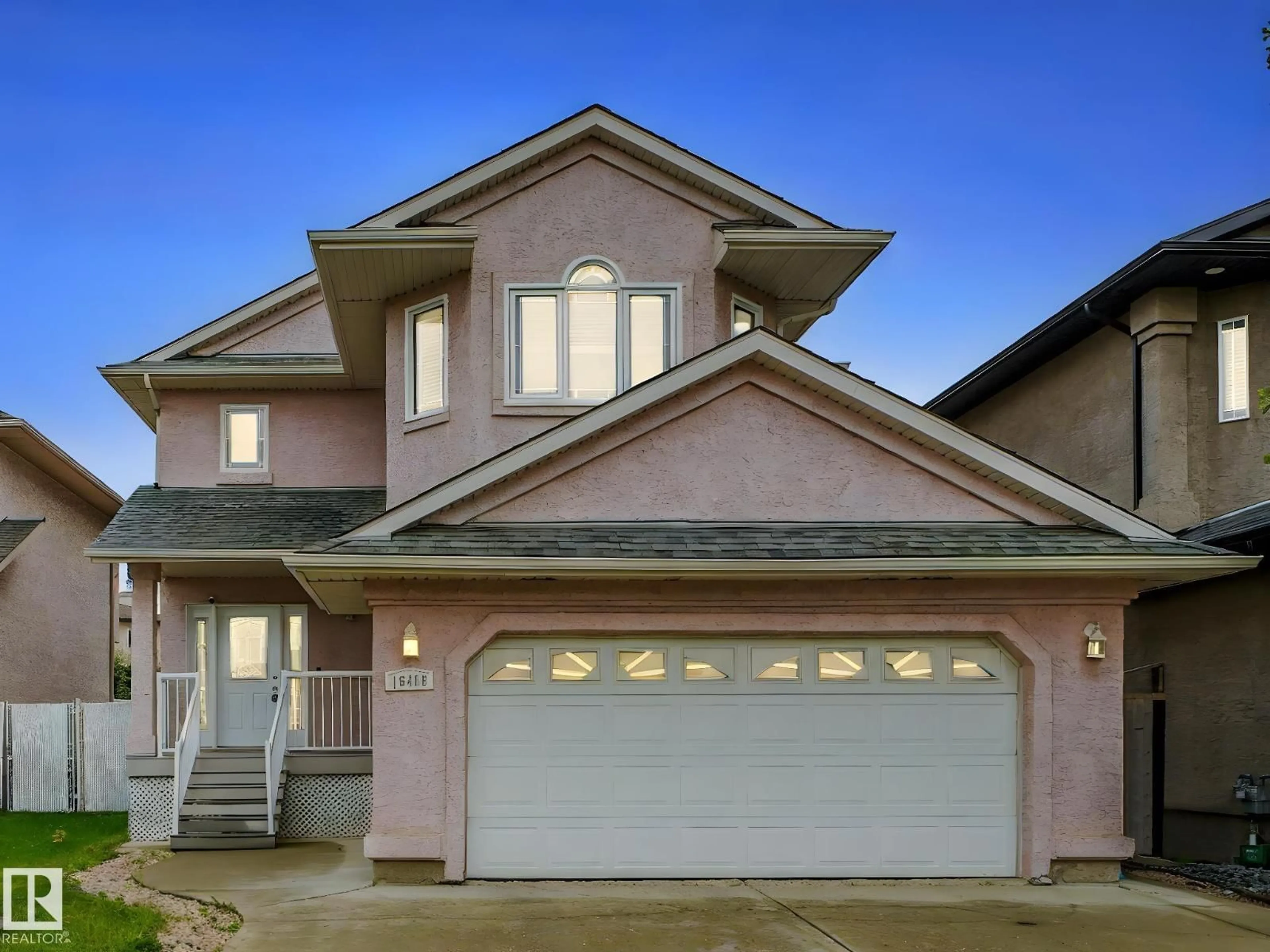 Home with vinyl exterior material, street for NW - 16409 65 ST, Edmonton Alberta T5Y3J3