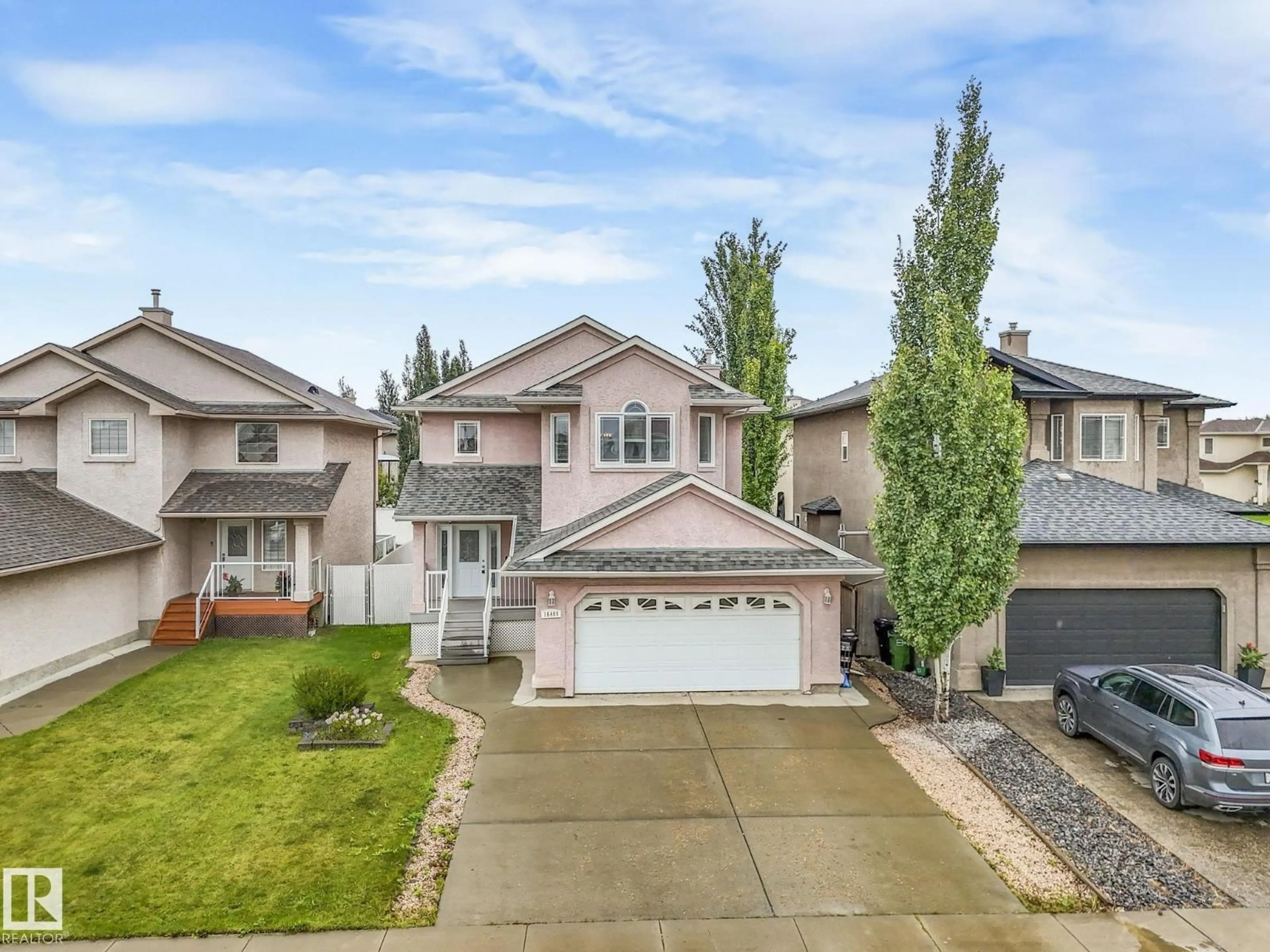 Home with vinyl exterior material, street for NW - 16409 65 ST, Edmonton Alberta T5Y3J3