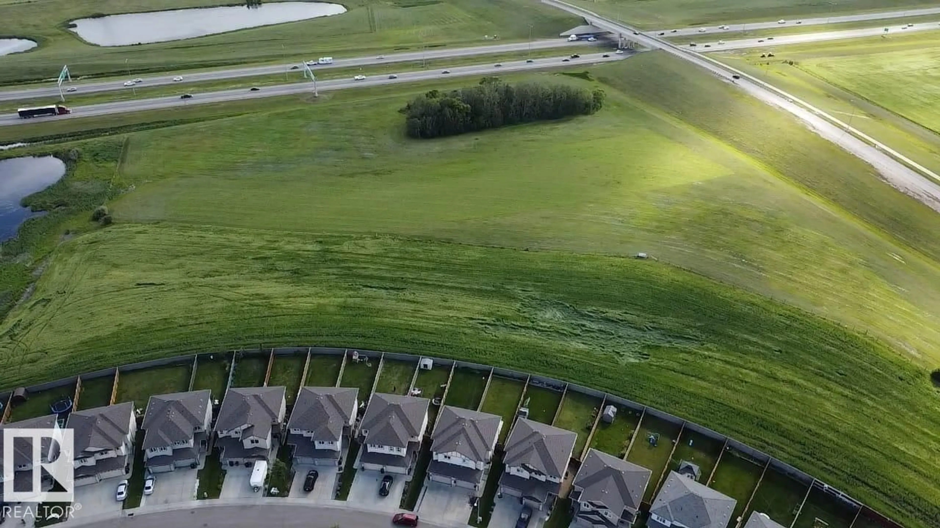 A pic from outside/outdoor area/front of a property/back of a property/a pic from drone, unknown for NW - 1128 33A ST, Edmonton Alberta T6T2C4