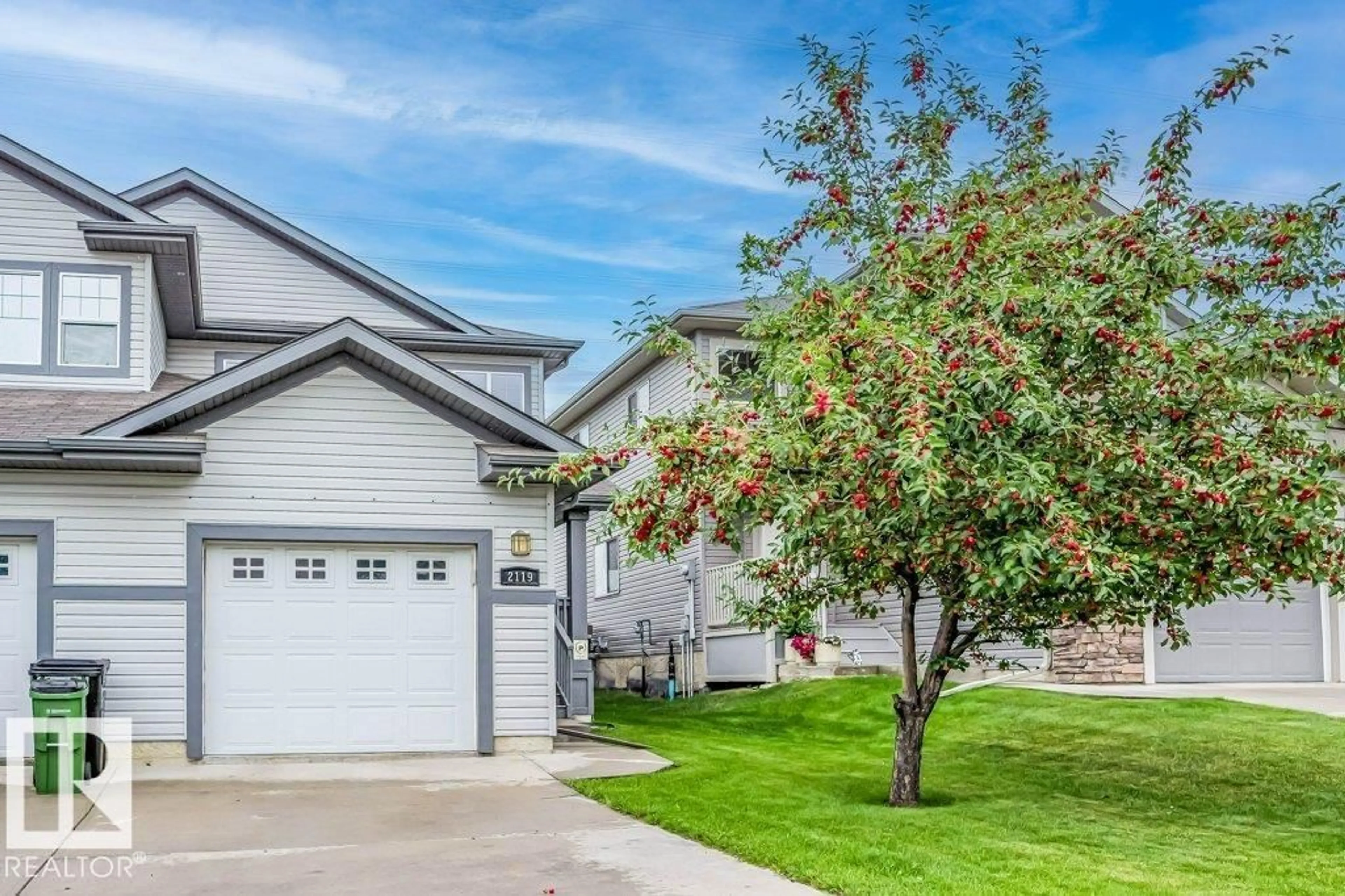 Home with vinyl exterior material, street for 2119 28 ST, Edmonton Alberta T6T0K2