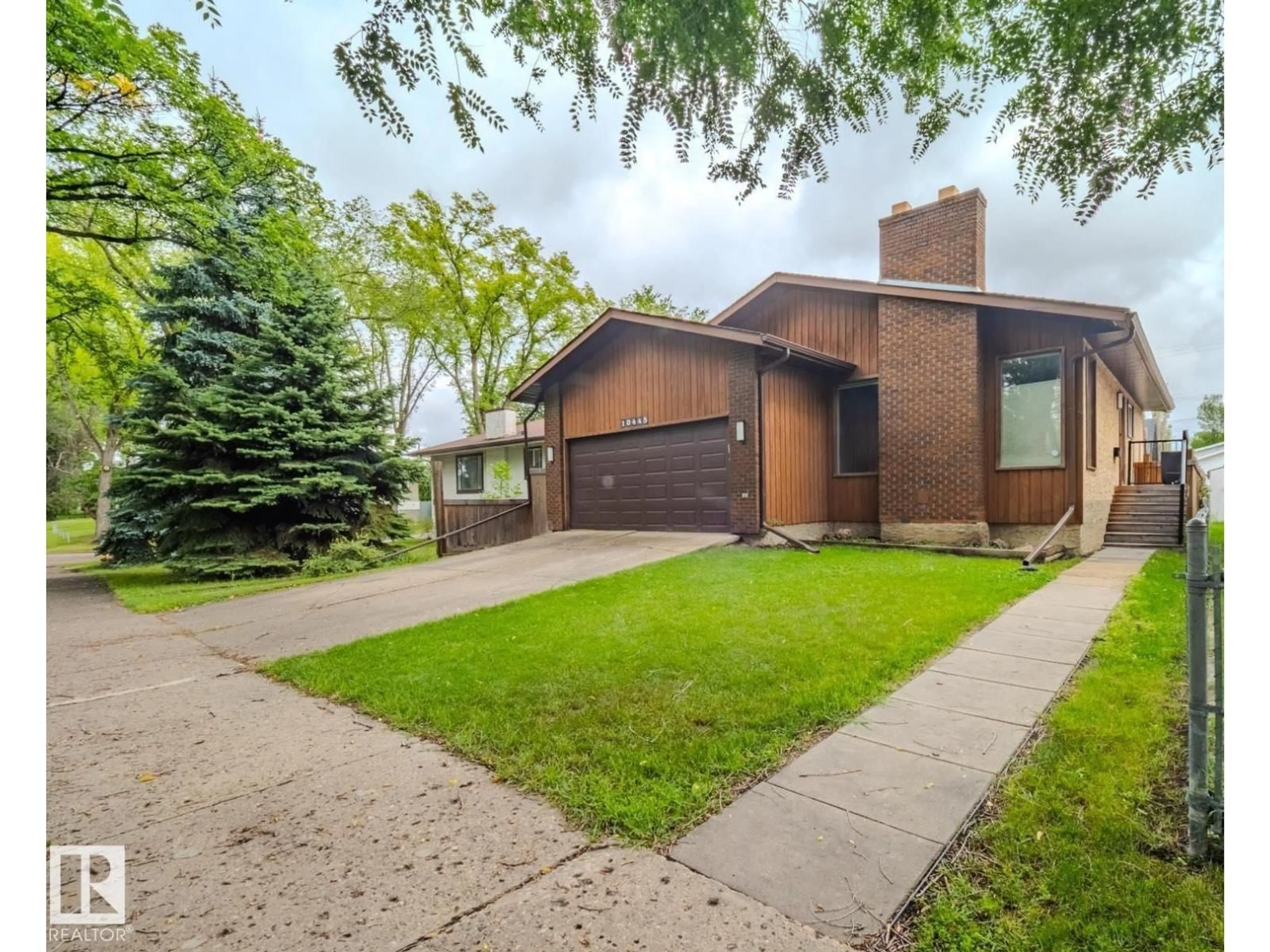 Home with brick exterior material, street for NW - 10445 81 ST, Edmonton Alberta T6A3K9