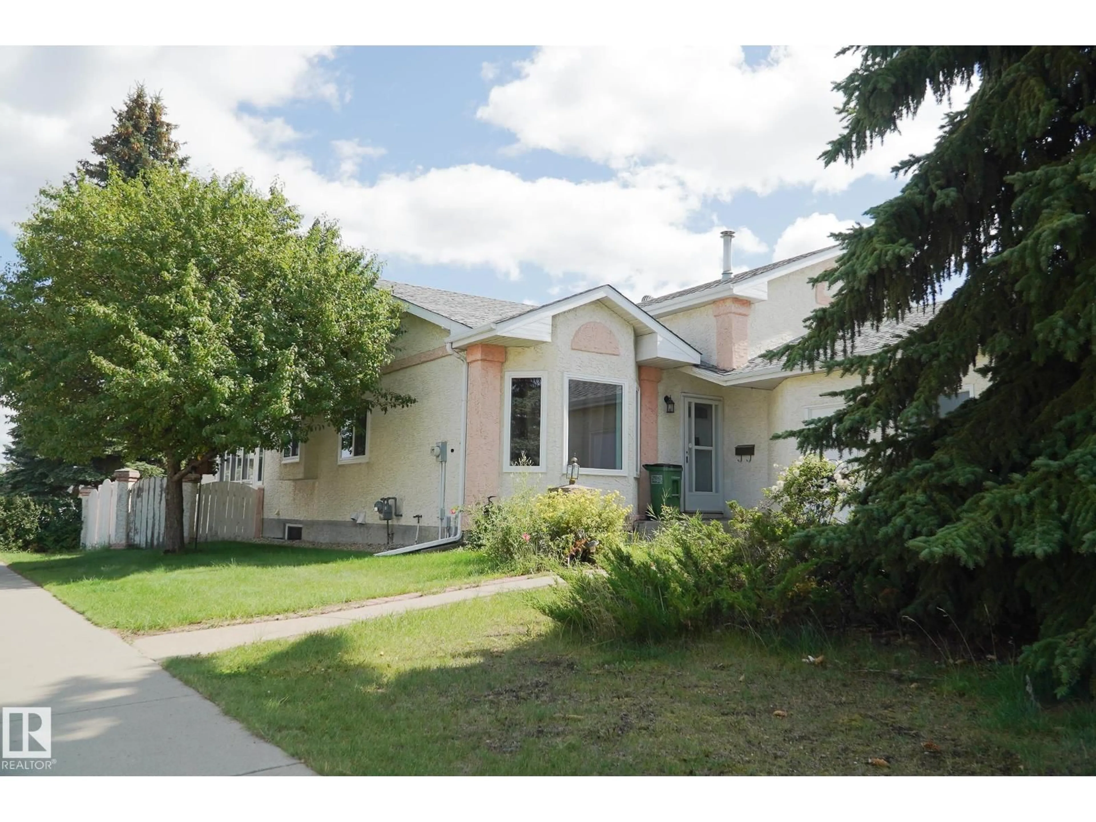 Home with vinyl exterior material, street for NW - 7271 190A ST, Edmonton Alberta T5T5T1