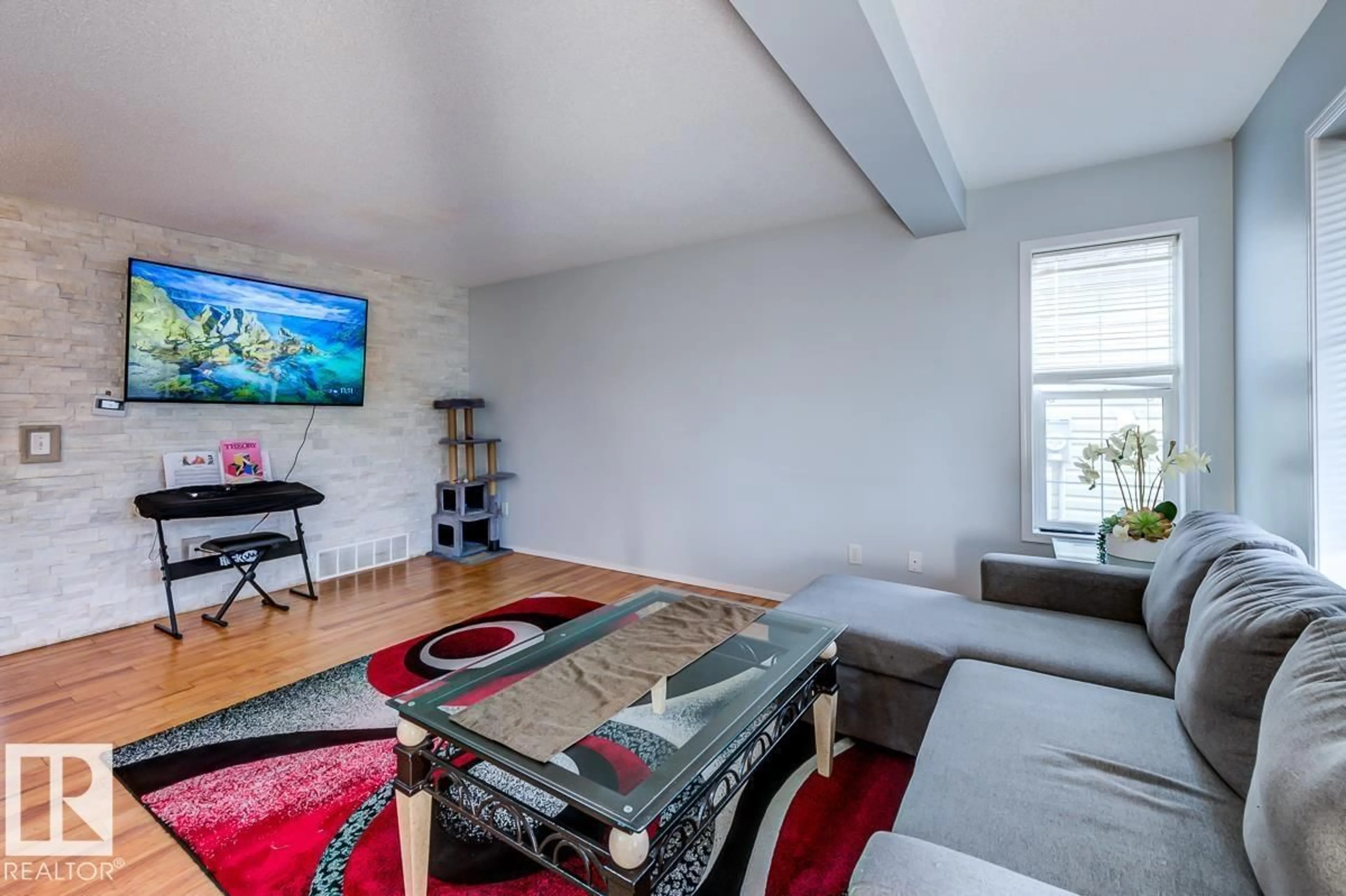 Living room with furniture, unknown for NW - 20141 53 AV, Edmonton Alberta T6M2W3