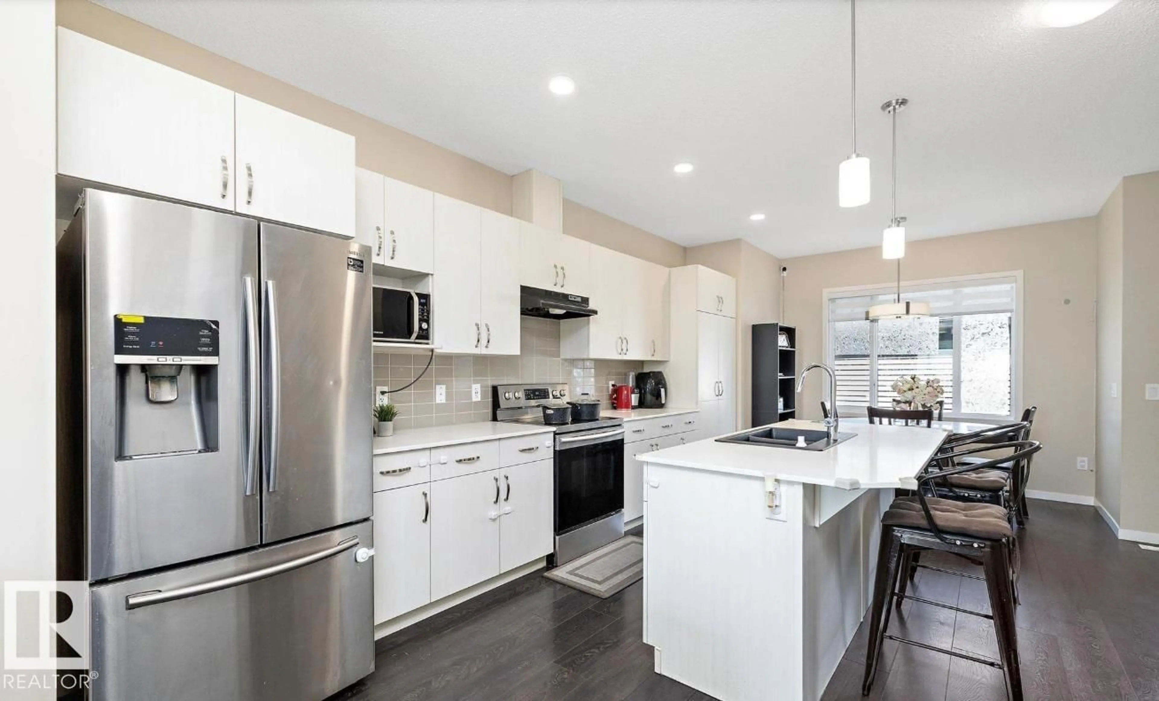 Open concept kitchen, ceramic/tile floor for 593 EBBERS WY, Edmonton Alberta T5Y1R8