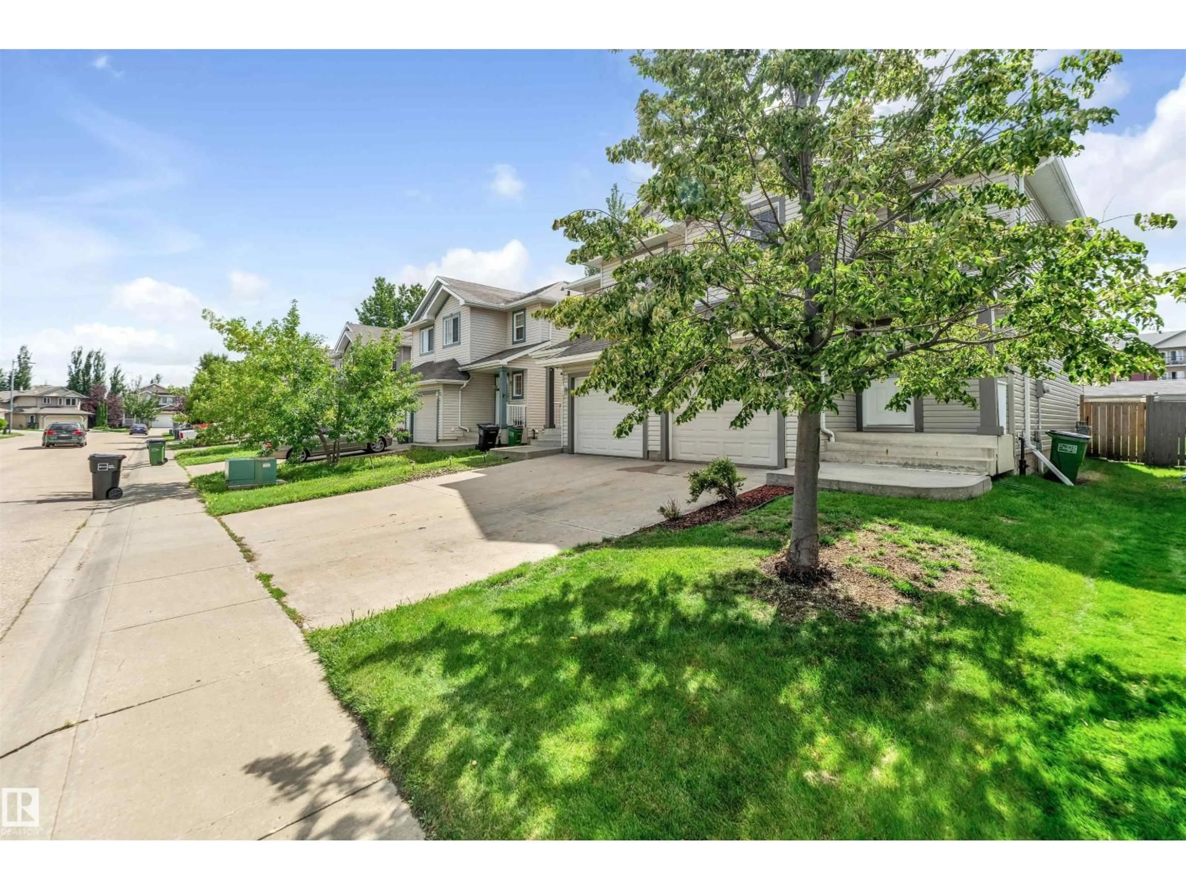 A pic from outside/outdoor area/front of a property/back of a property/a pic from drone, street for 7751 8 AV, Edmonton Alberta T6X0A4