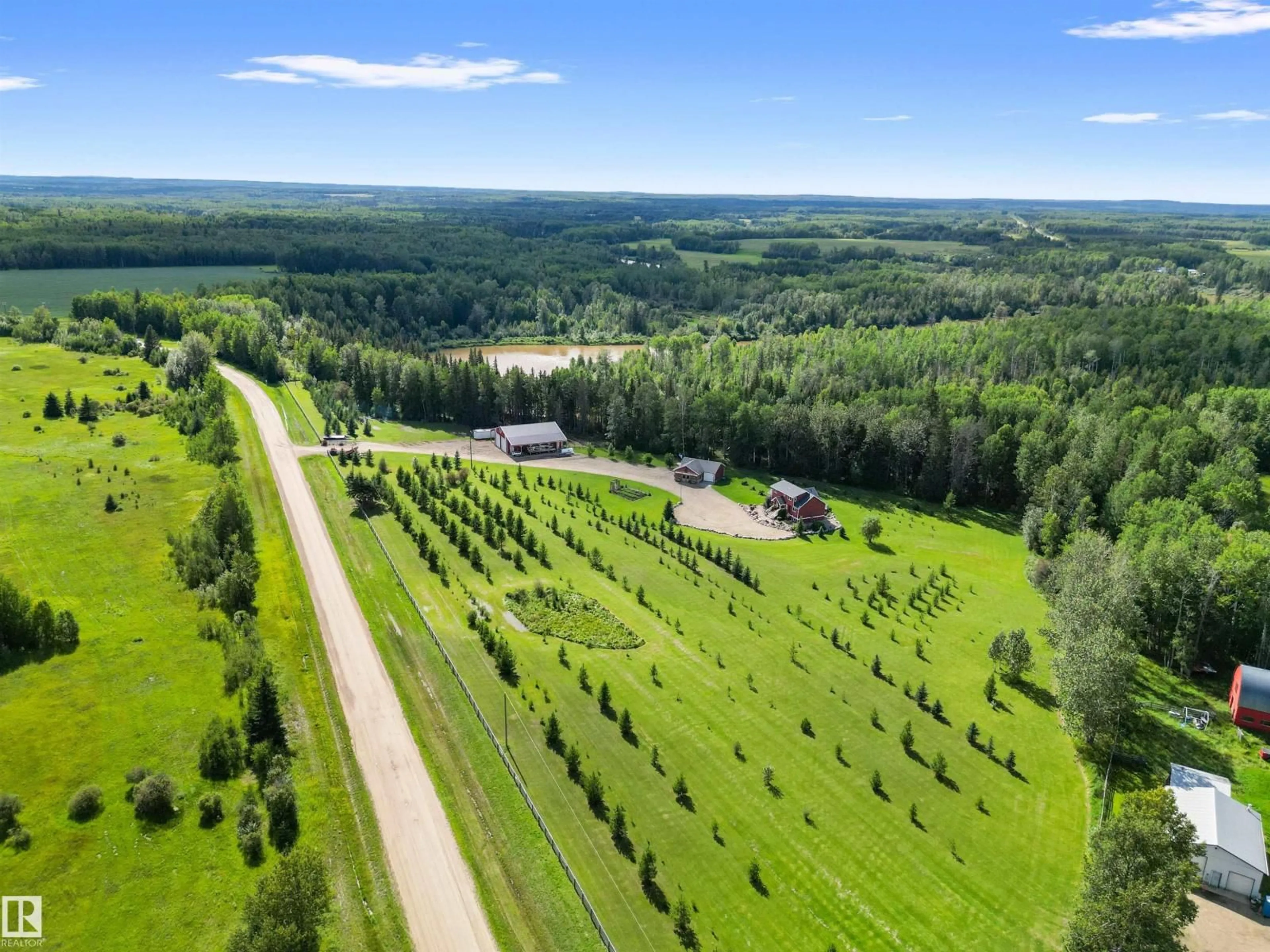 A pic from outside/outdoor area/front of a property/back of a property/a pic from drone, forest/trees view for 8432 TWP ROAD 502, Rural Brazeau County Alberta T7A2A3