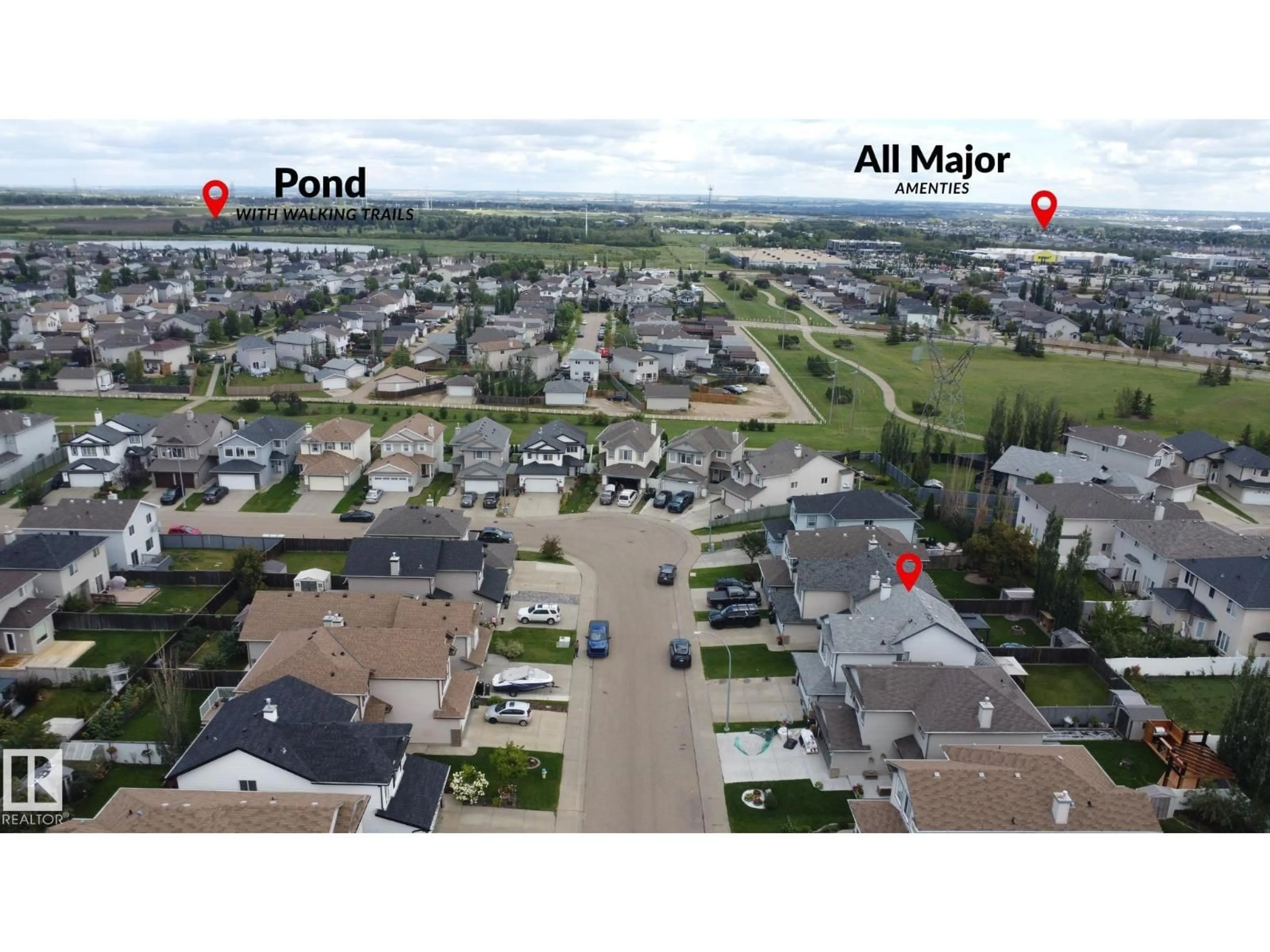 A pic from outside/outdoor area/front of a property/back of a property/a pic from drone, street for 4511 162A AV, Edmonton Alberta T5Y3M5