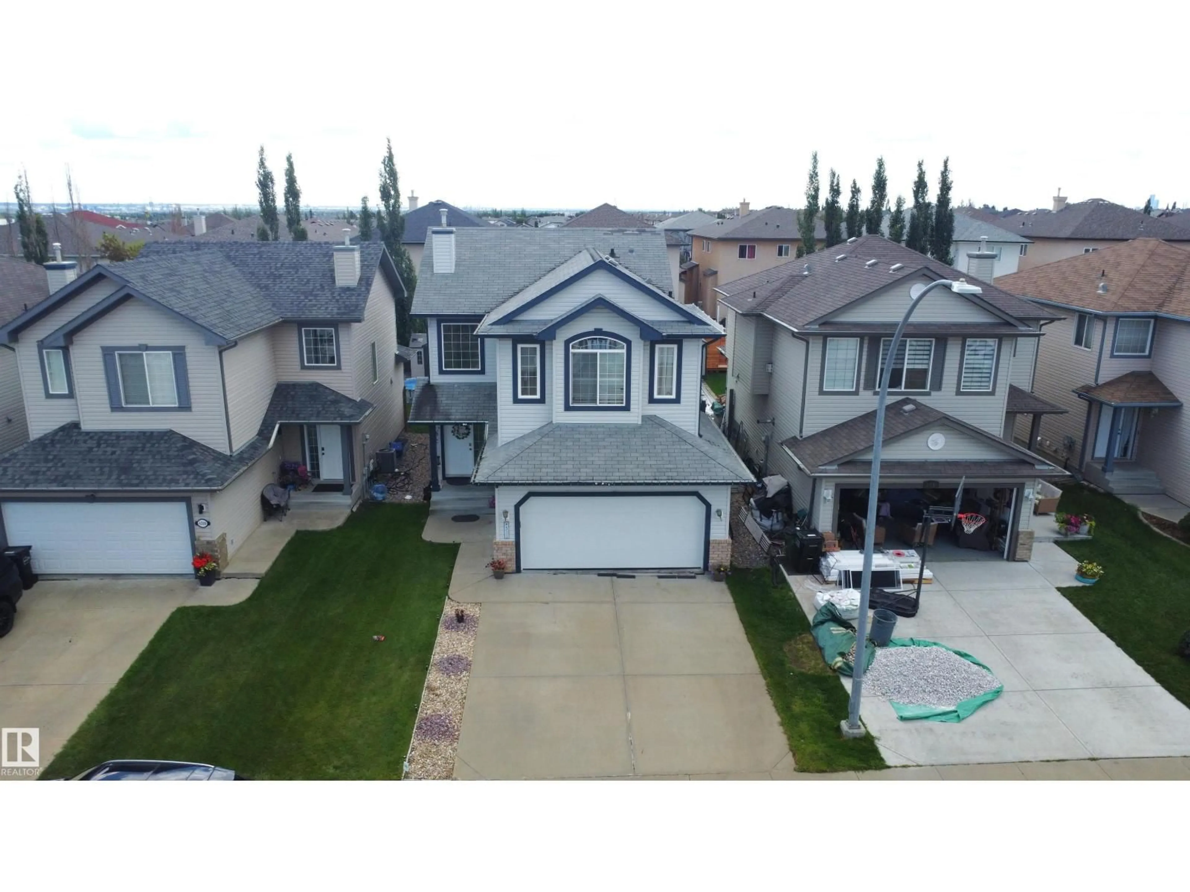 A pic from outside/outdoor area/front of a property/back of a property/a pic from drone, street for 4511 162A AV, Edmonton Alberta T5Y3M5