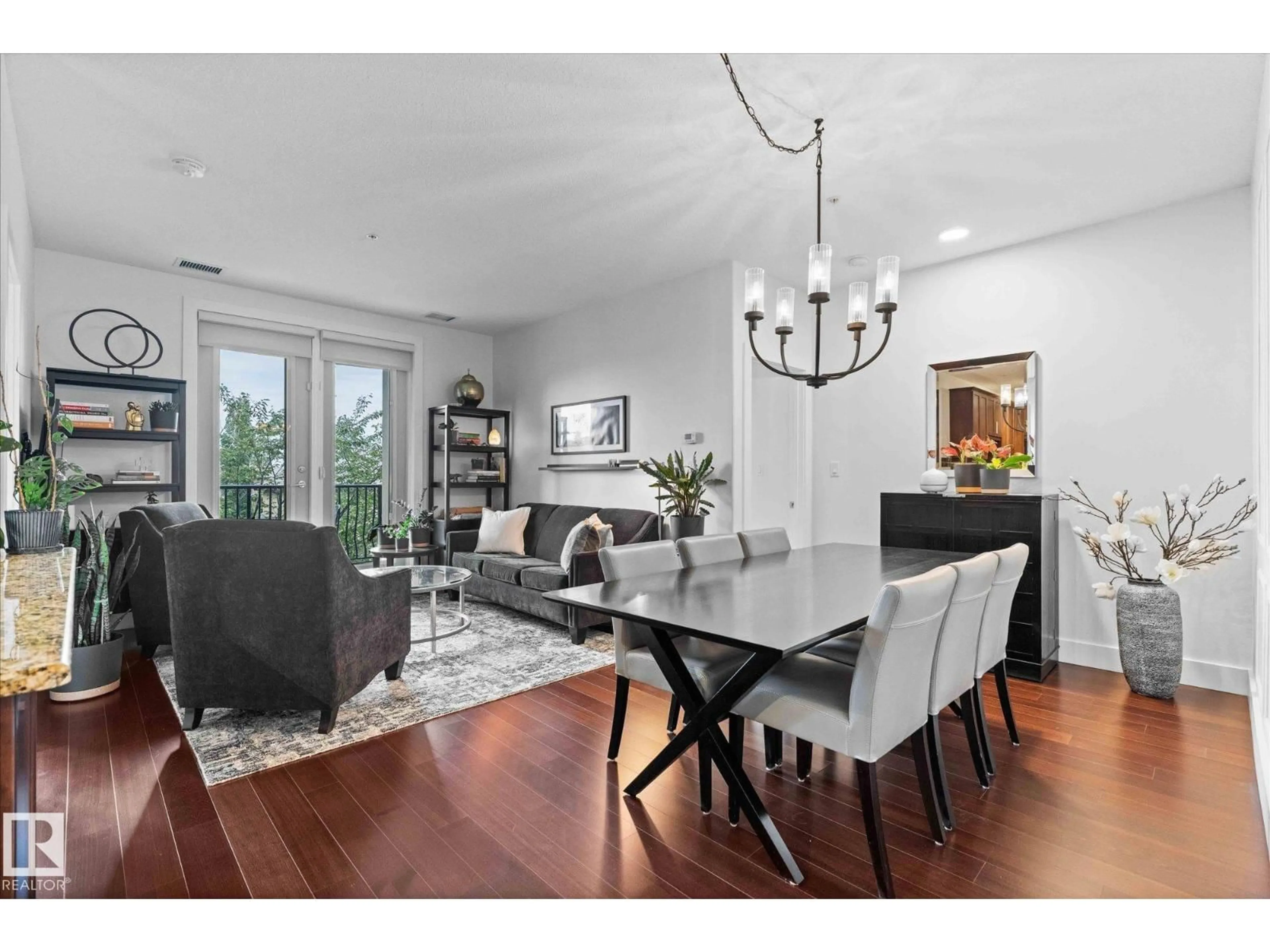 Dining room, wood/laminate floor for 352 - 6079 MAYNARD WY, Edmonton Alberta T6R0S4