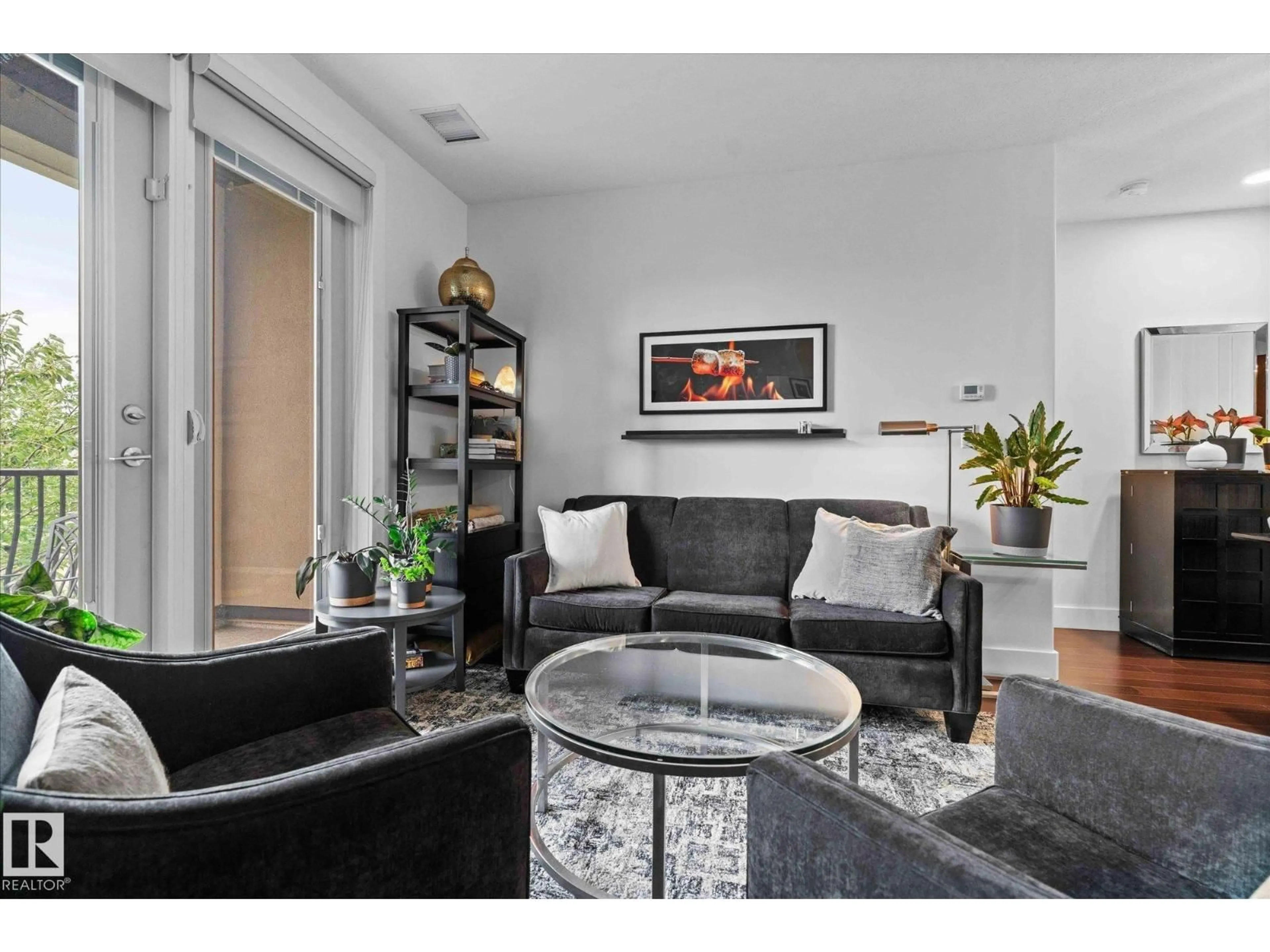 Living room with furniture, unknown for 352 - 6079 MAYNARD WY, Edmonton Alberta T6R0S4