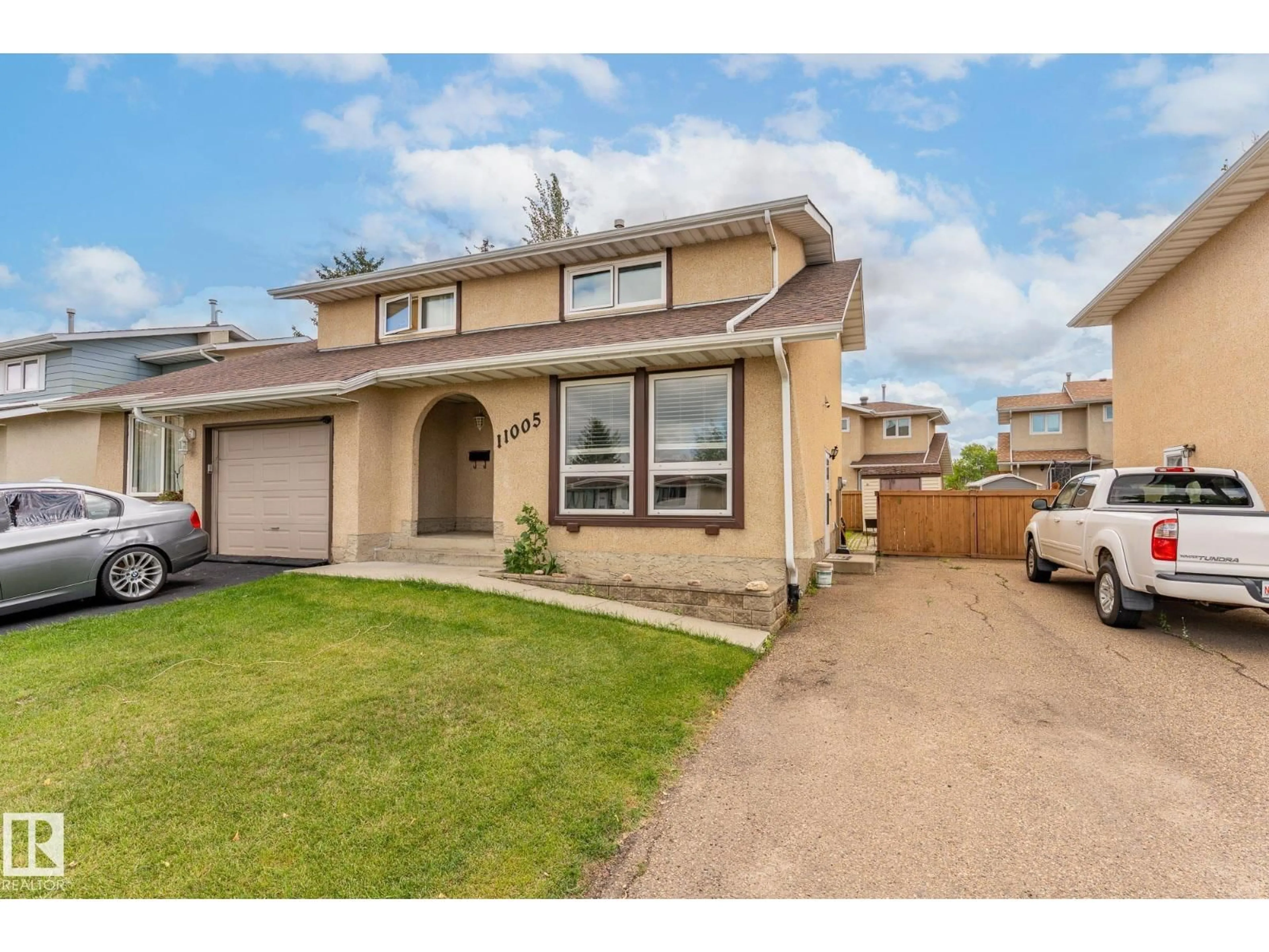Home with vinyl exterior material, street for 11005 162A AV, Edmonton Alberta T5X1Z8