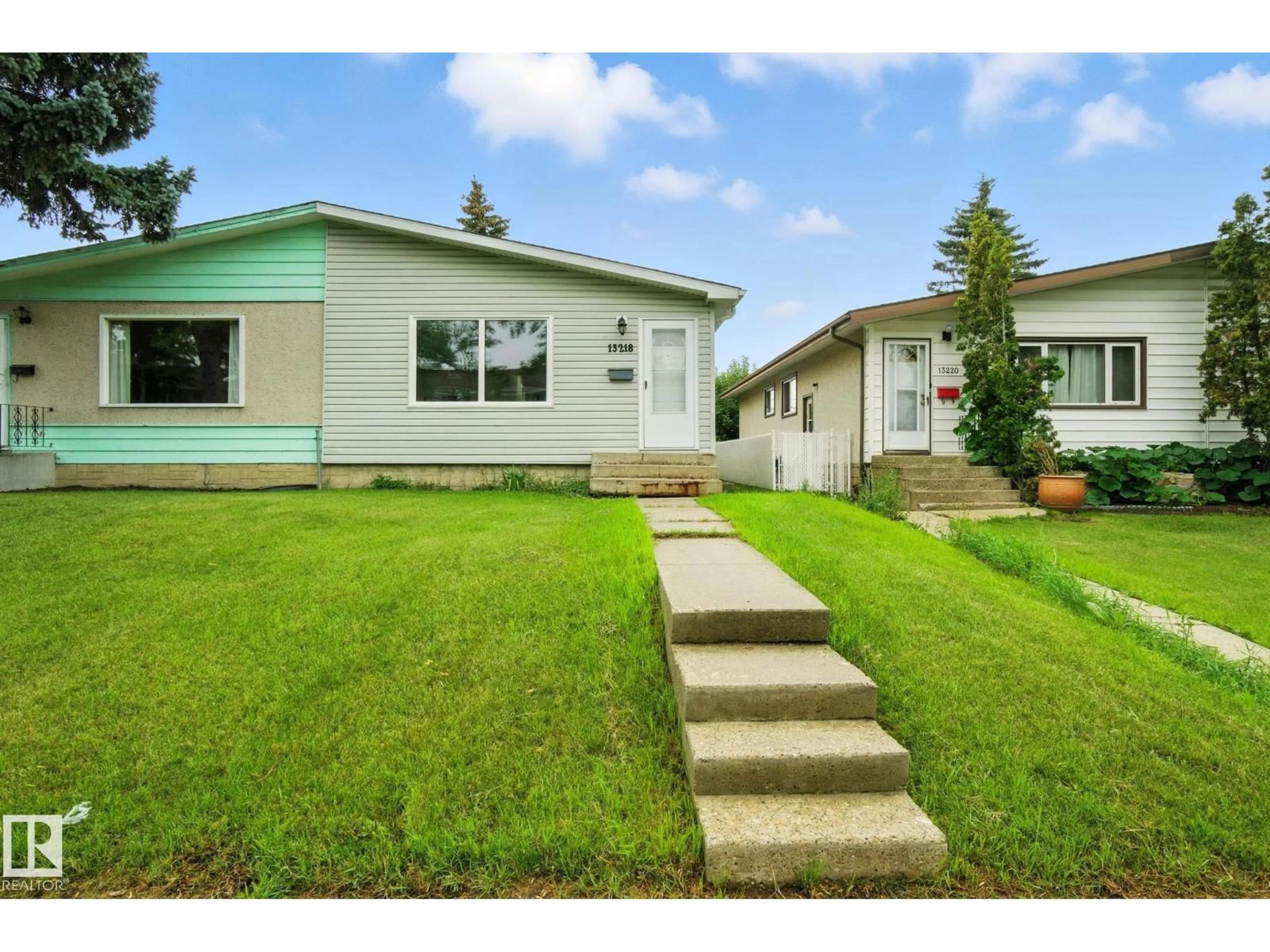 Home with vinyl exterior material, street for 13218 81 ST, Edmonton Alberta T5C1N7
