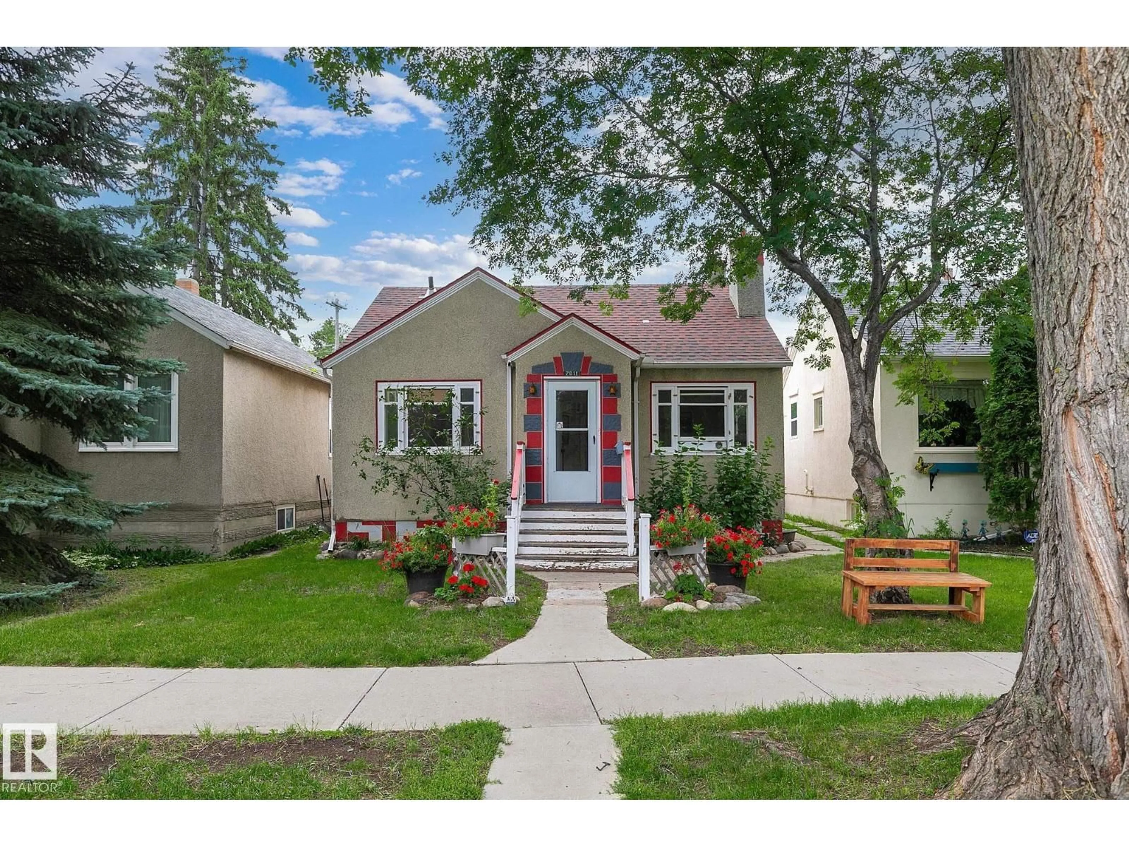 Home with vinyl exterior material, street for NW - 7611 112 AV, Edmonton Alberta T5B0H4