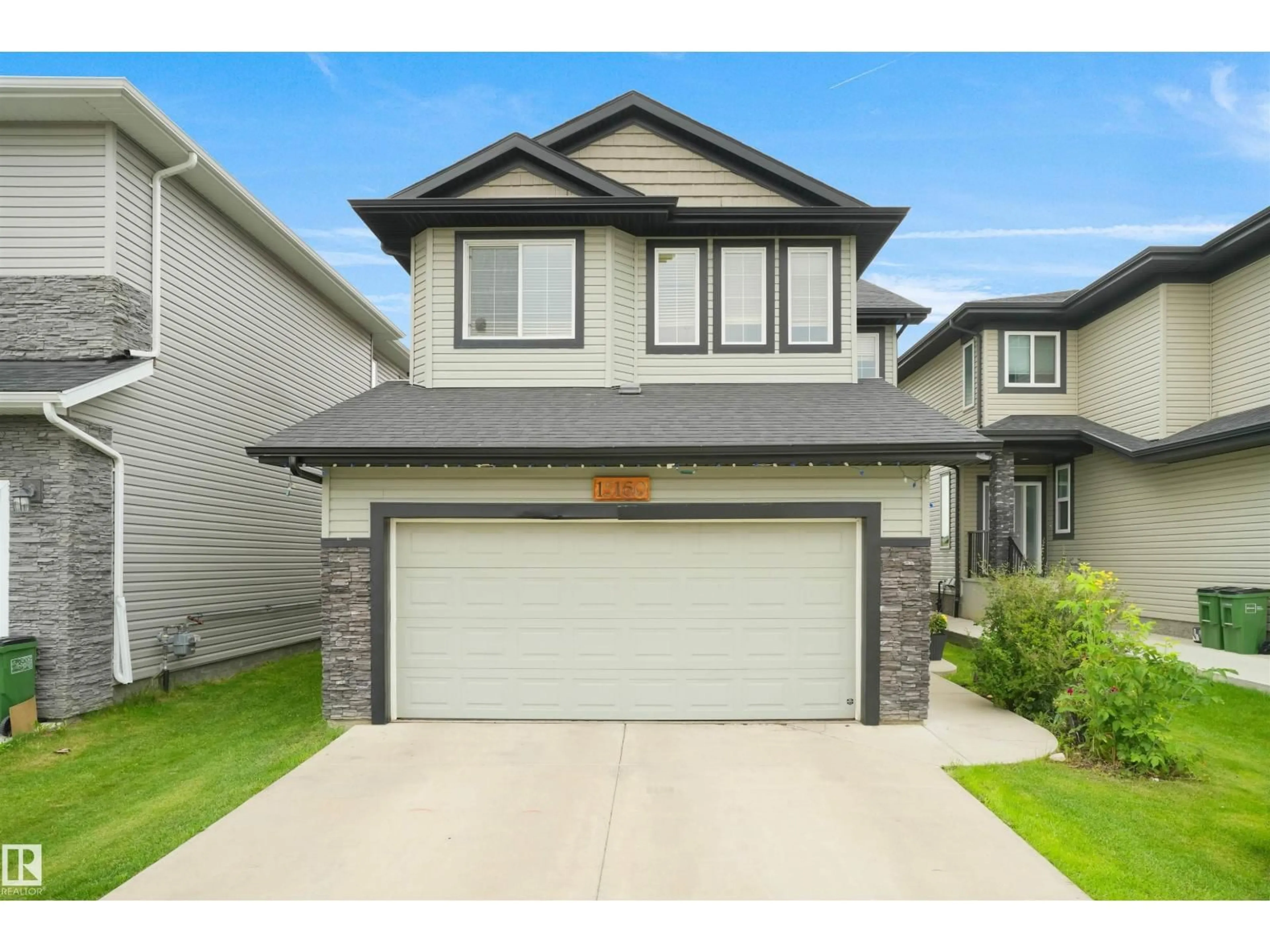 Home with vinyl exterior material, street for 15160 16 ST, Edmonton Alberta T5Y0Y6