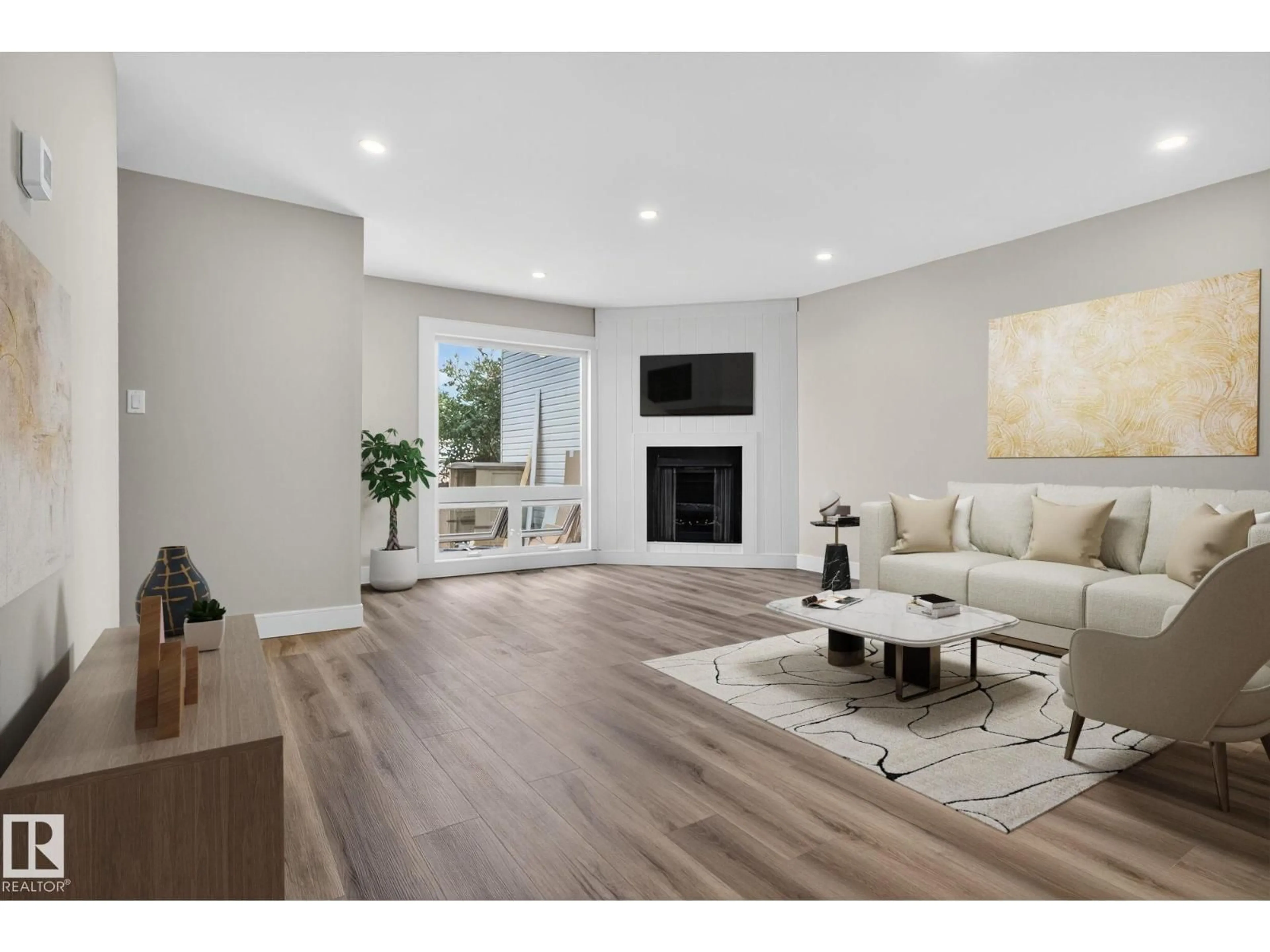 Living room with furniture, wood/laminate floor for 197 MARLBOROUGH PL, Edmonton Alberta T5T1Y6