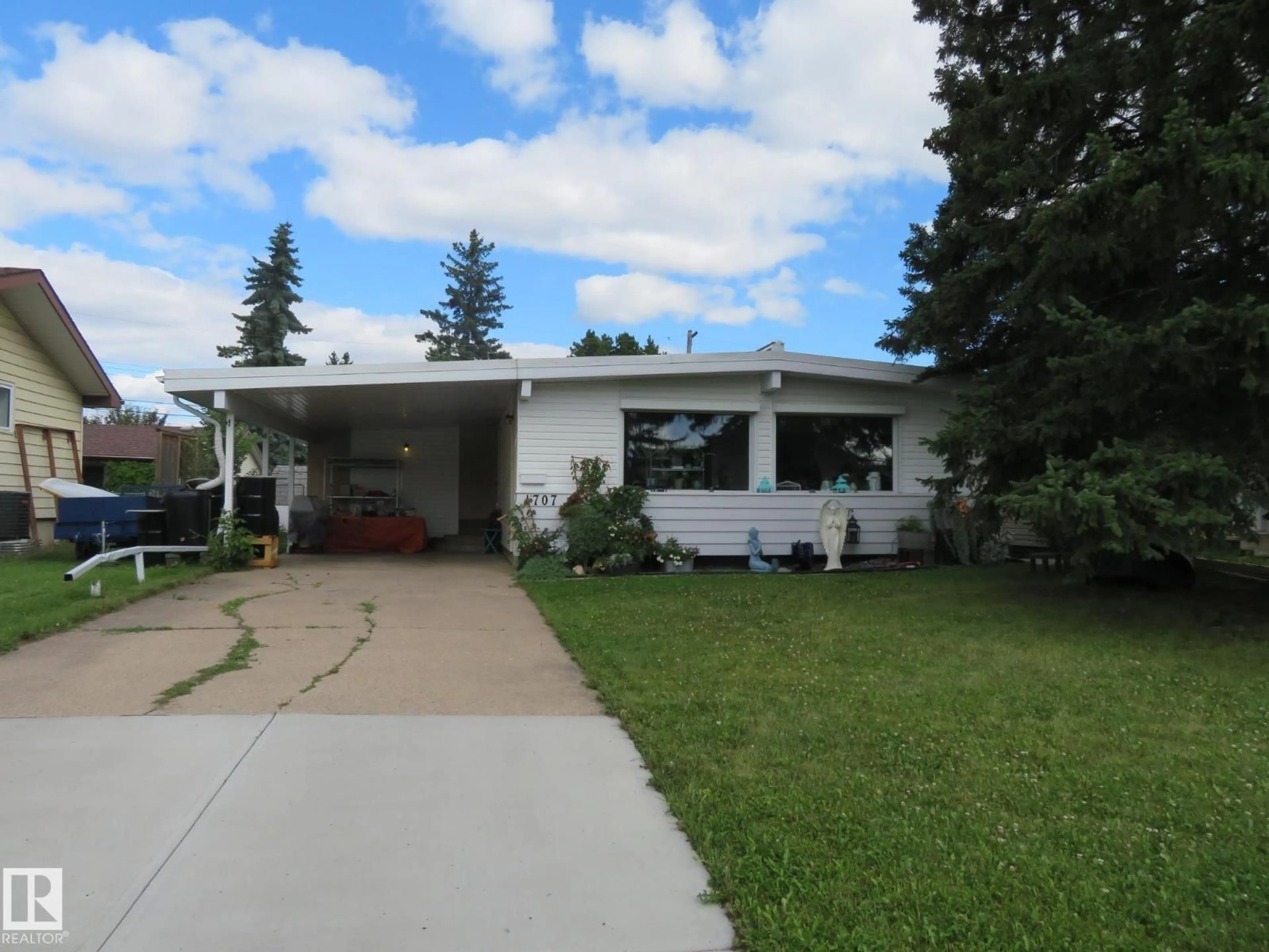 Home with vinyl exterior material, street for 4707 117A ST, Edmonton Alberta T6H3R9