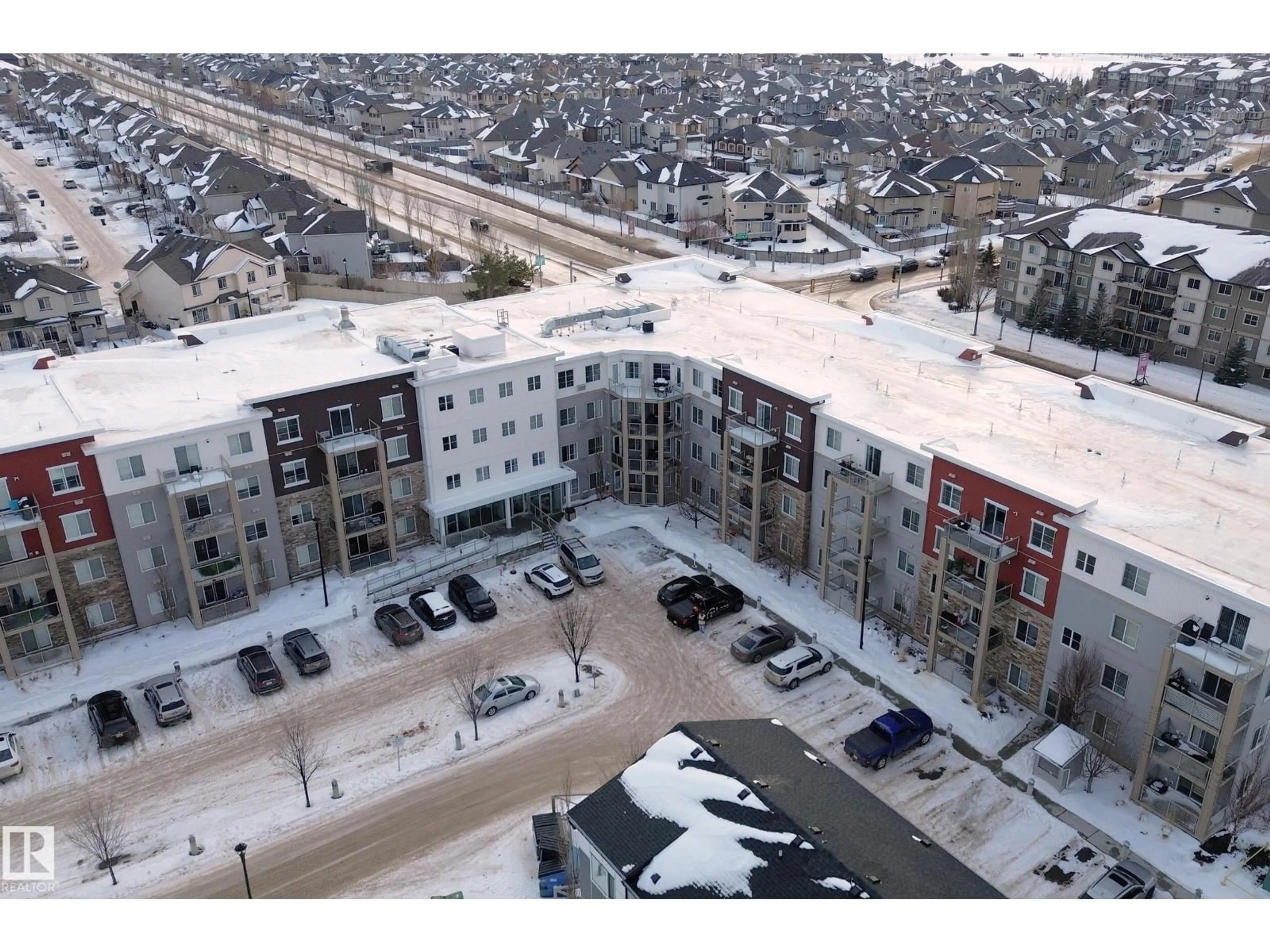 A pic from outside/outdoor area/front of a property/back of a property/a pic from drone, city buildings view from balcony for #103 - 812 WELSH DR, Edmonton Alberta T6X1Y7