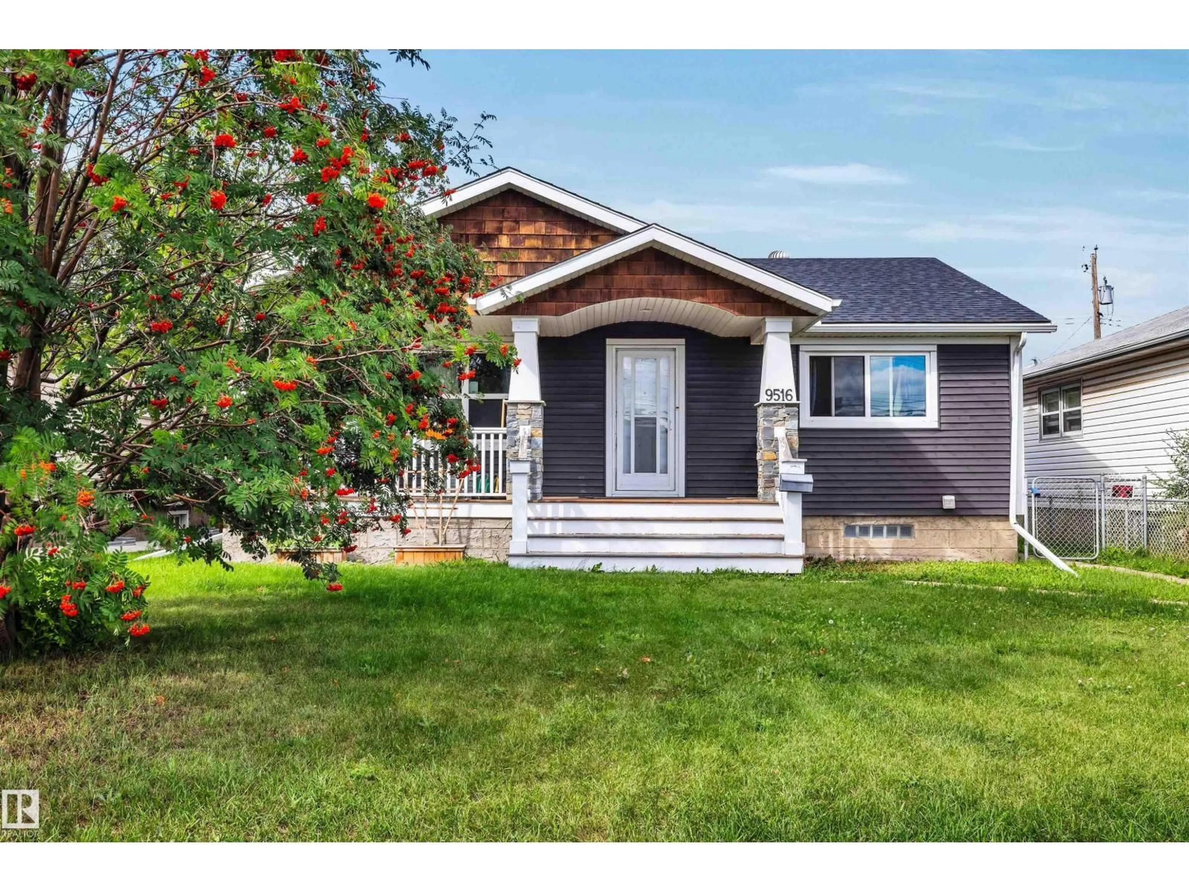 Home with vinyl exterior material, street for 9516 63 AV, Edmonton Alberta T6E0G4