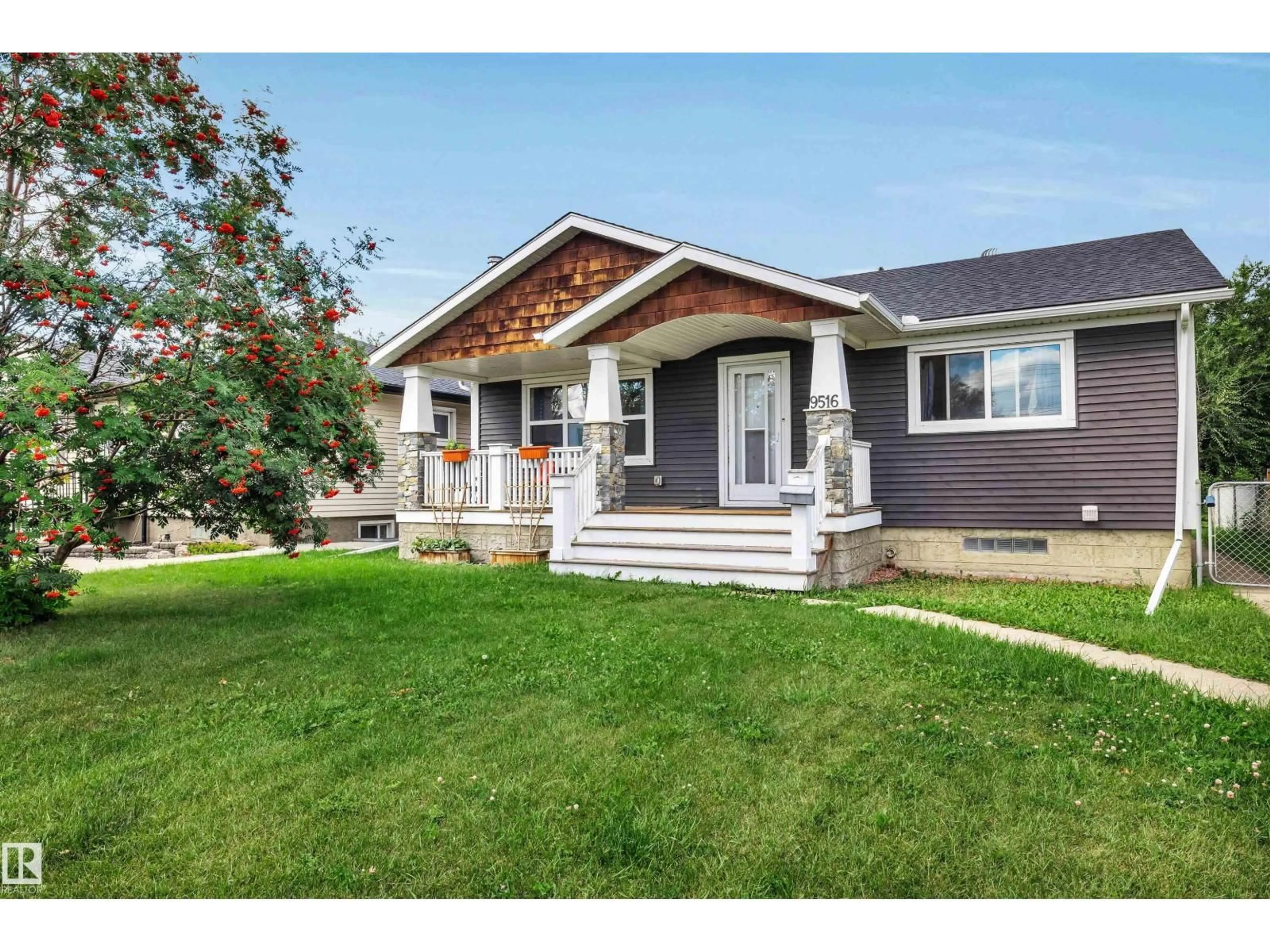 Home with vinyl exterior material, street for 9516 63 AV, Edmonton Alberta T6E0G4