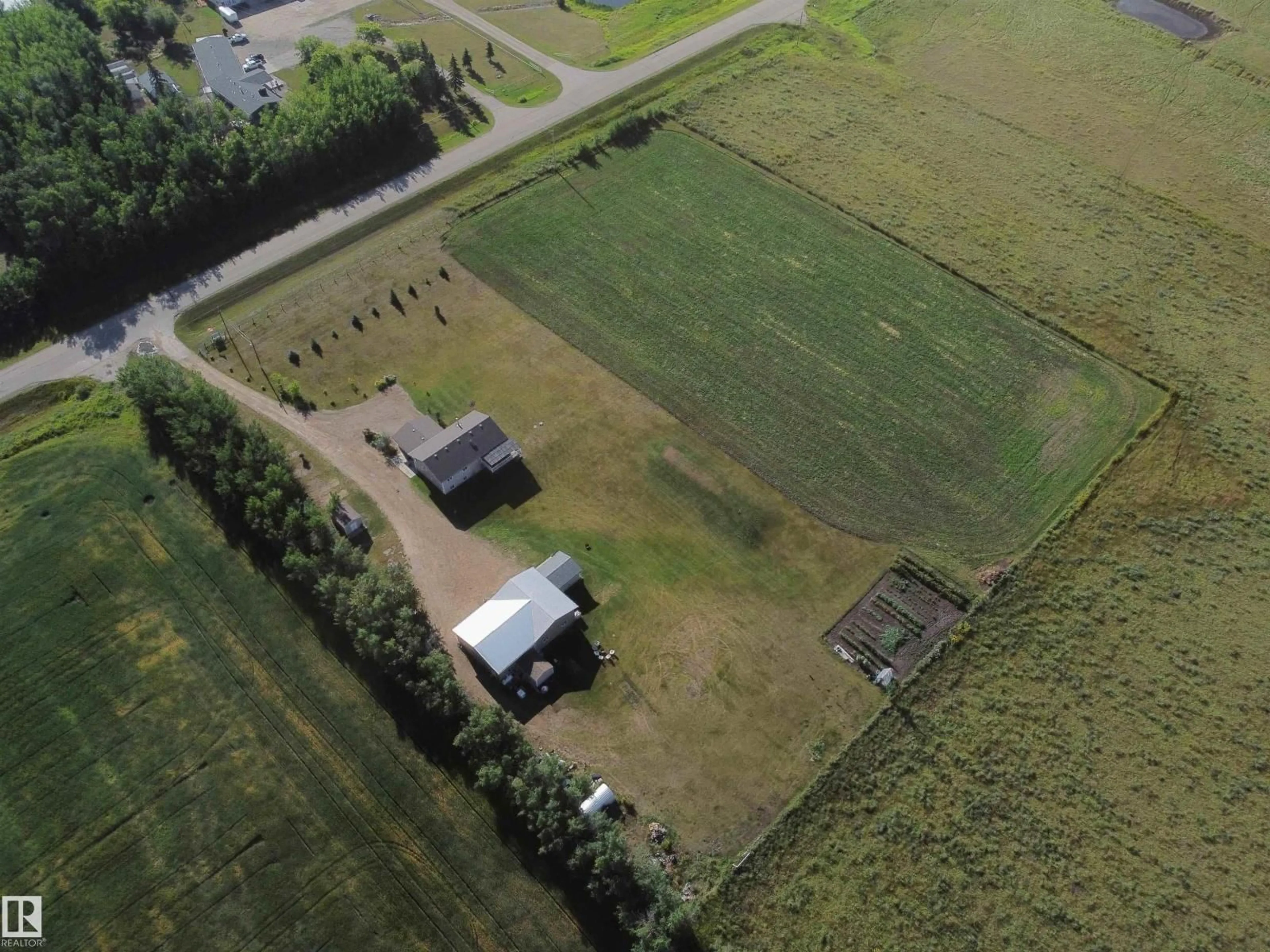 A pic from outside/outdoor area/front of a property/back of a property/a pic from drone, building for 59116 RGE RD 23, Rural Barrhead County Alberta T7N1N4