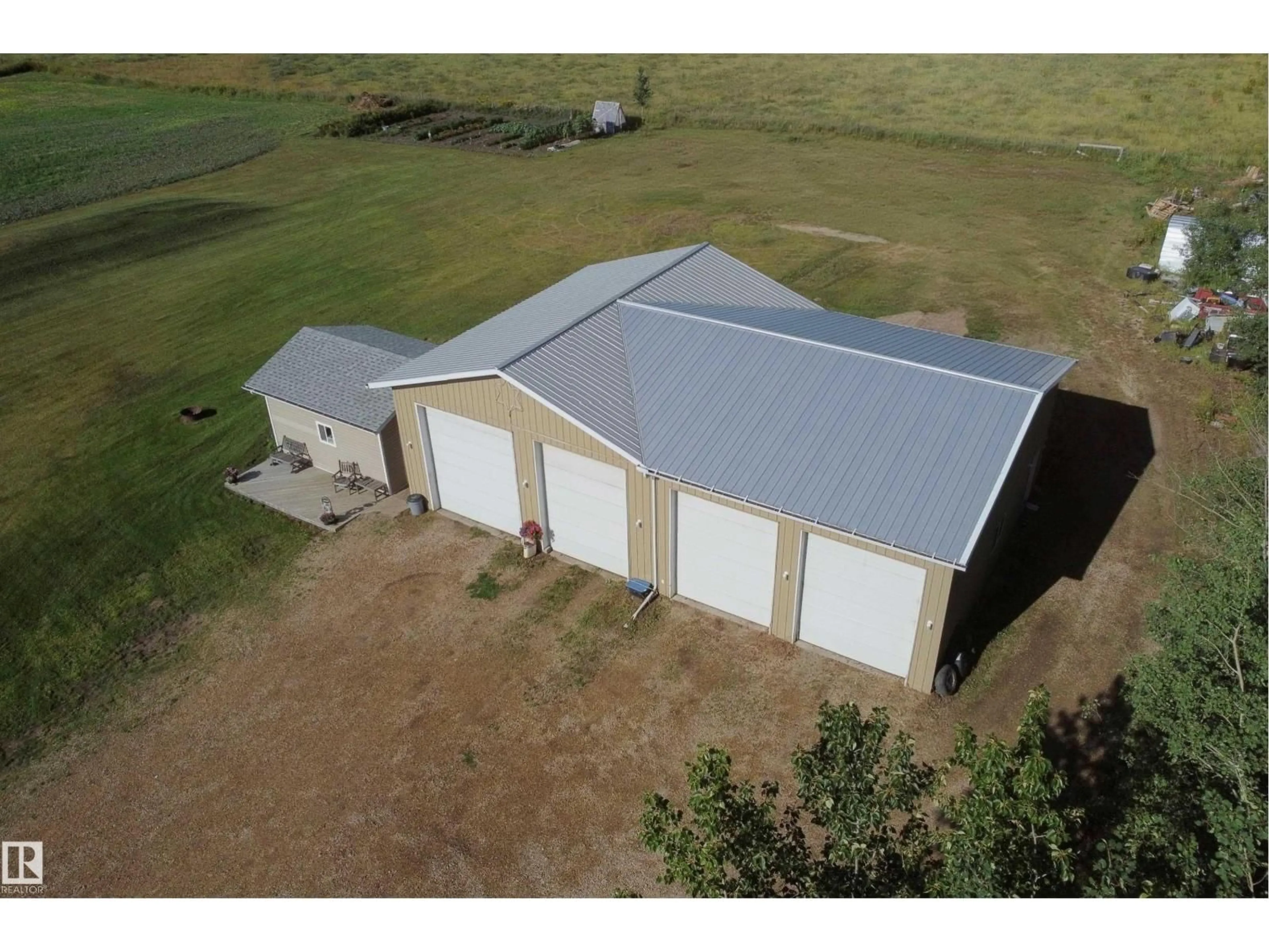 A pic from outside/outdoor area/front of a property/back of a property/a pic from drone, building for 59116 RGE RD 23, Rural Barrhead County Alberta T7N1N4