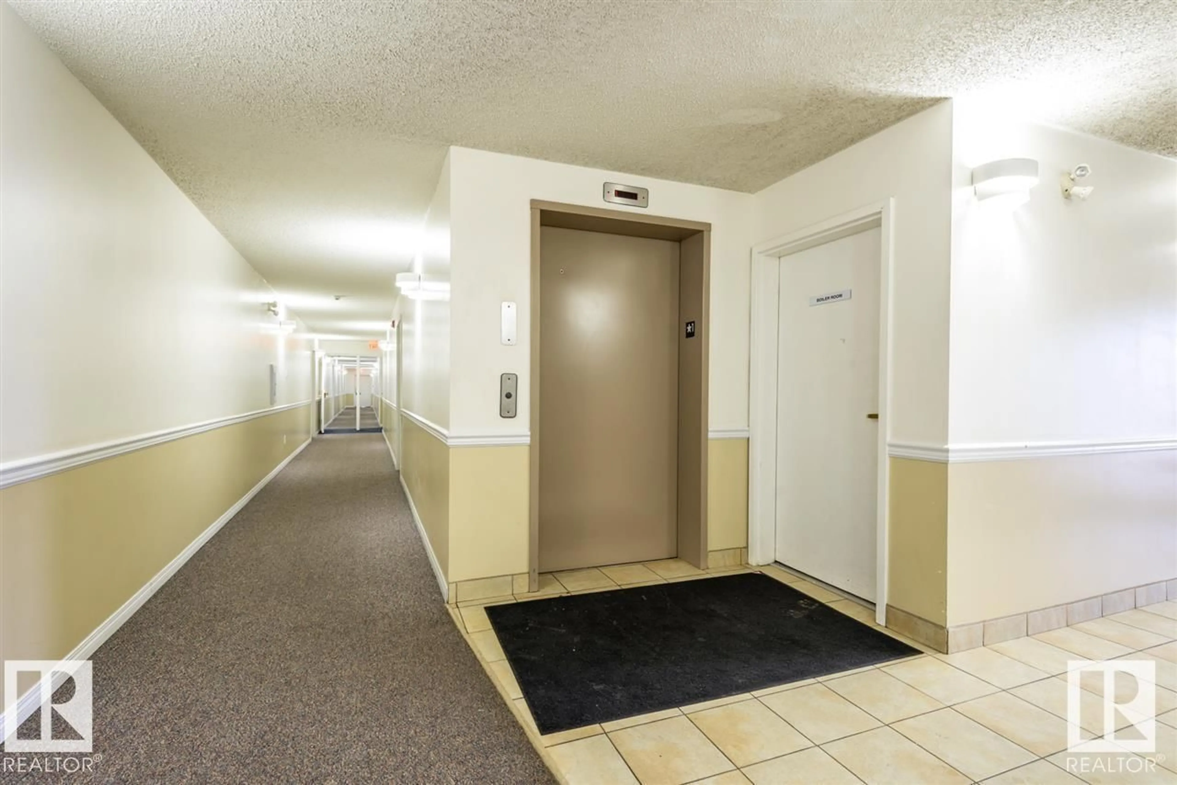 Indoor foyer for 329 - 4210 139 AV NW, Edmonton Alberta T5Y2W6