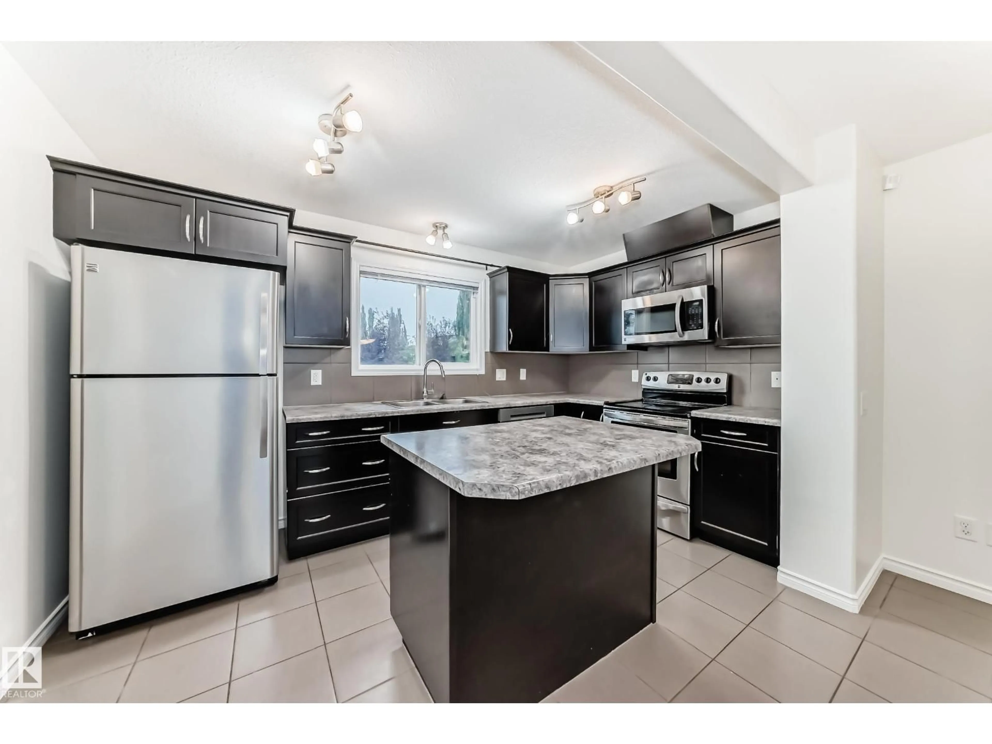 Open concept kitchen, ceramic/tile floor for 351 SECORD BV, Edmonton Alberta T5T3Y6