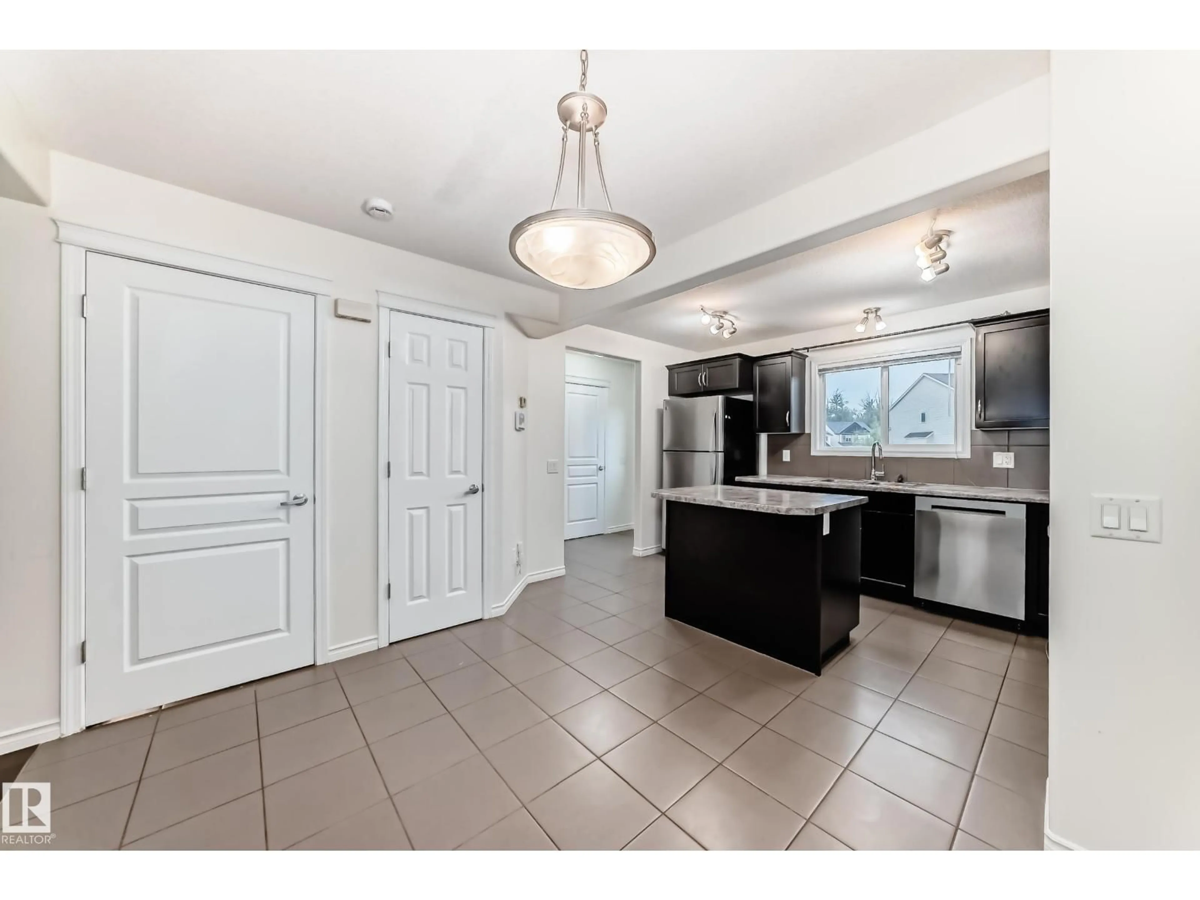 Open concept kitchen, ceramic/tile floor for 351 SECORD BV, Edmonton Alberta T5T3Y6