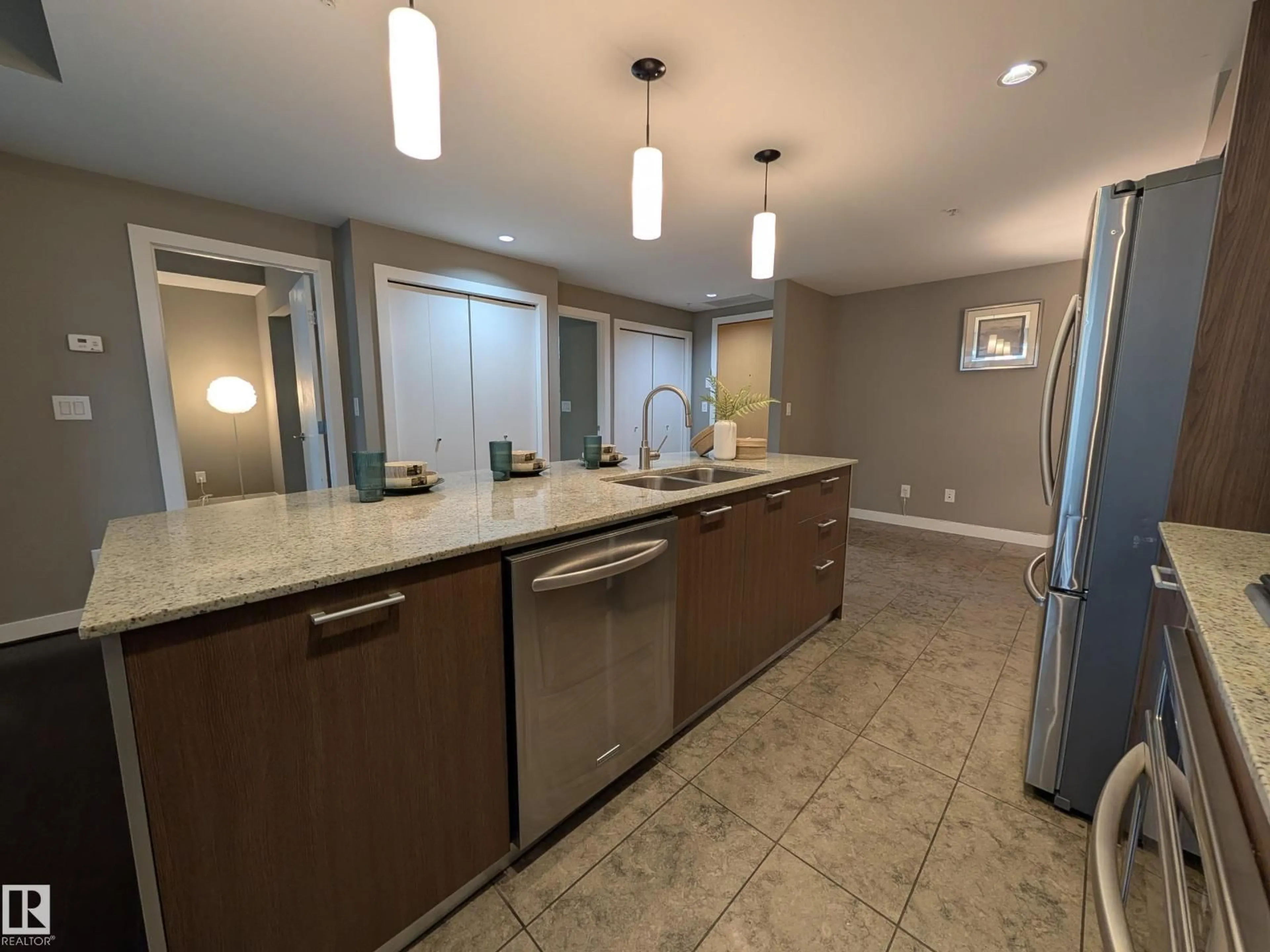 Open concept kitchen, ceramic/tile floor for #416 - 2510 109 ST NW, Edmonton Alberta T6J2X1