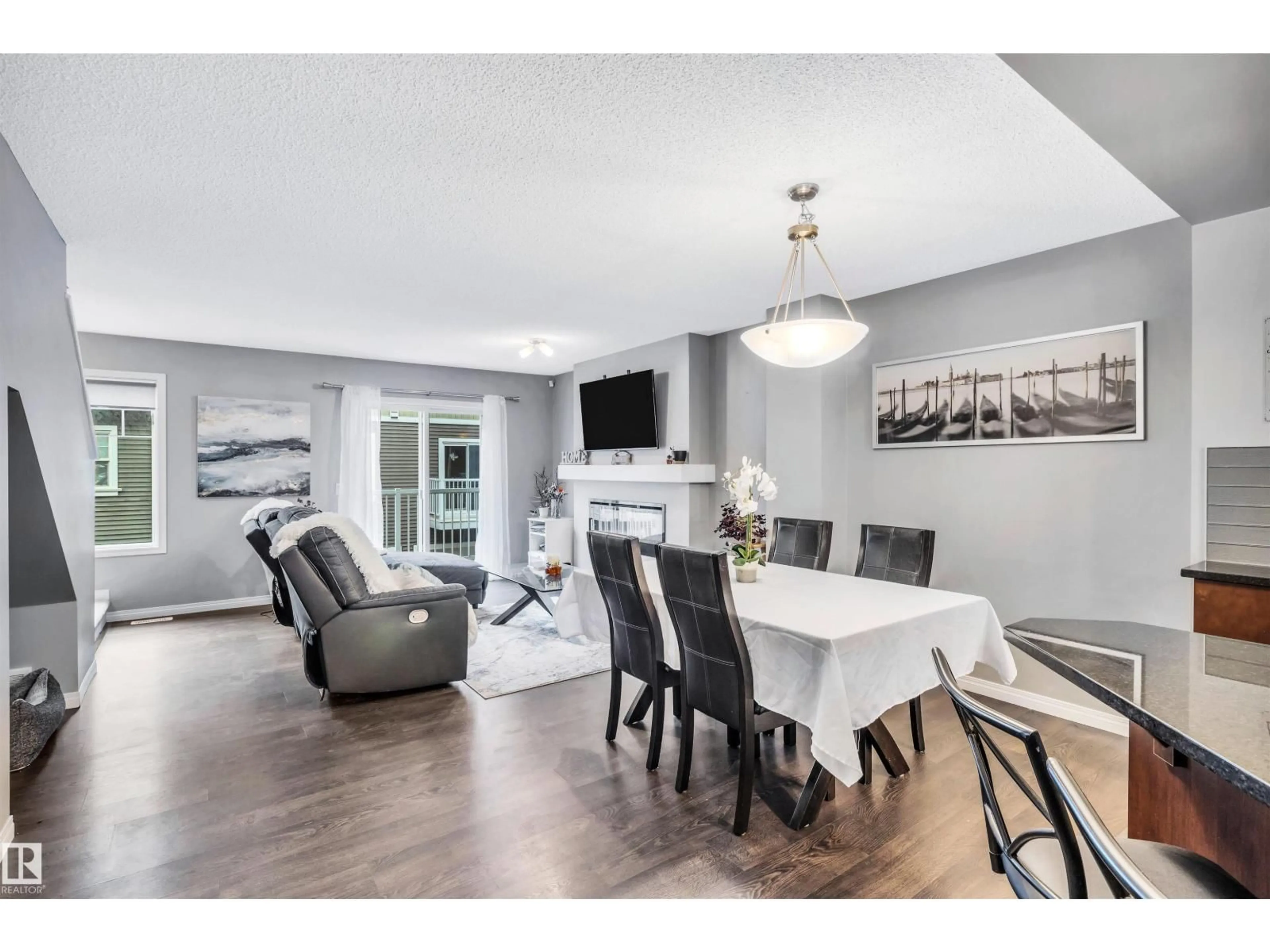 Dining room, wood/laminate floor for 4050 - 19 SAVARYN DR, Edmonton Alberta T6X1R8