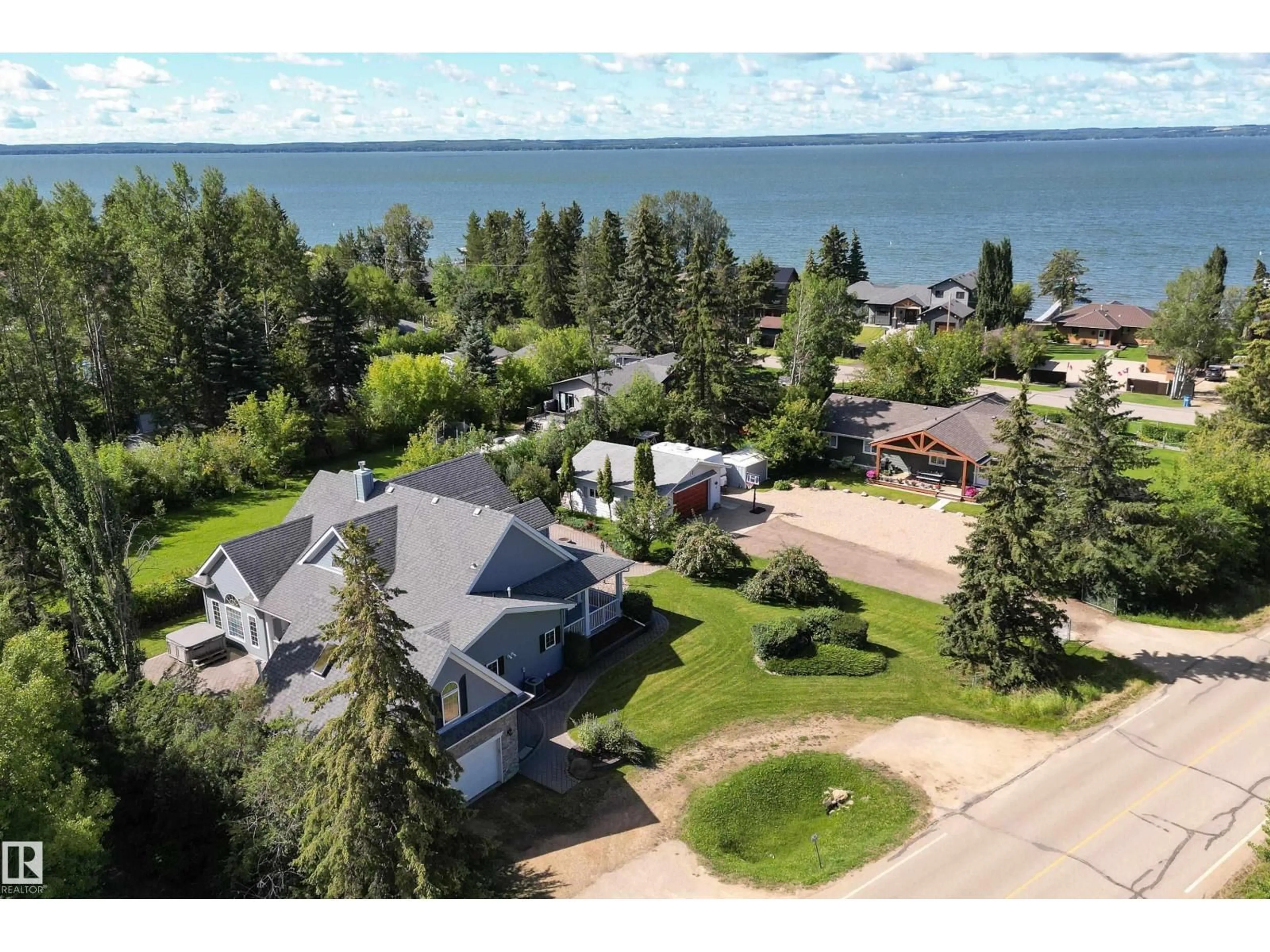 A pic from outside/outdoor area/front of a property/back of a property/a pic from drone, water/lake/river/ocean view for 2A SILVER BEACH RD, Rural Wetaskiwin County Alberta T0C2V0