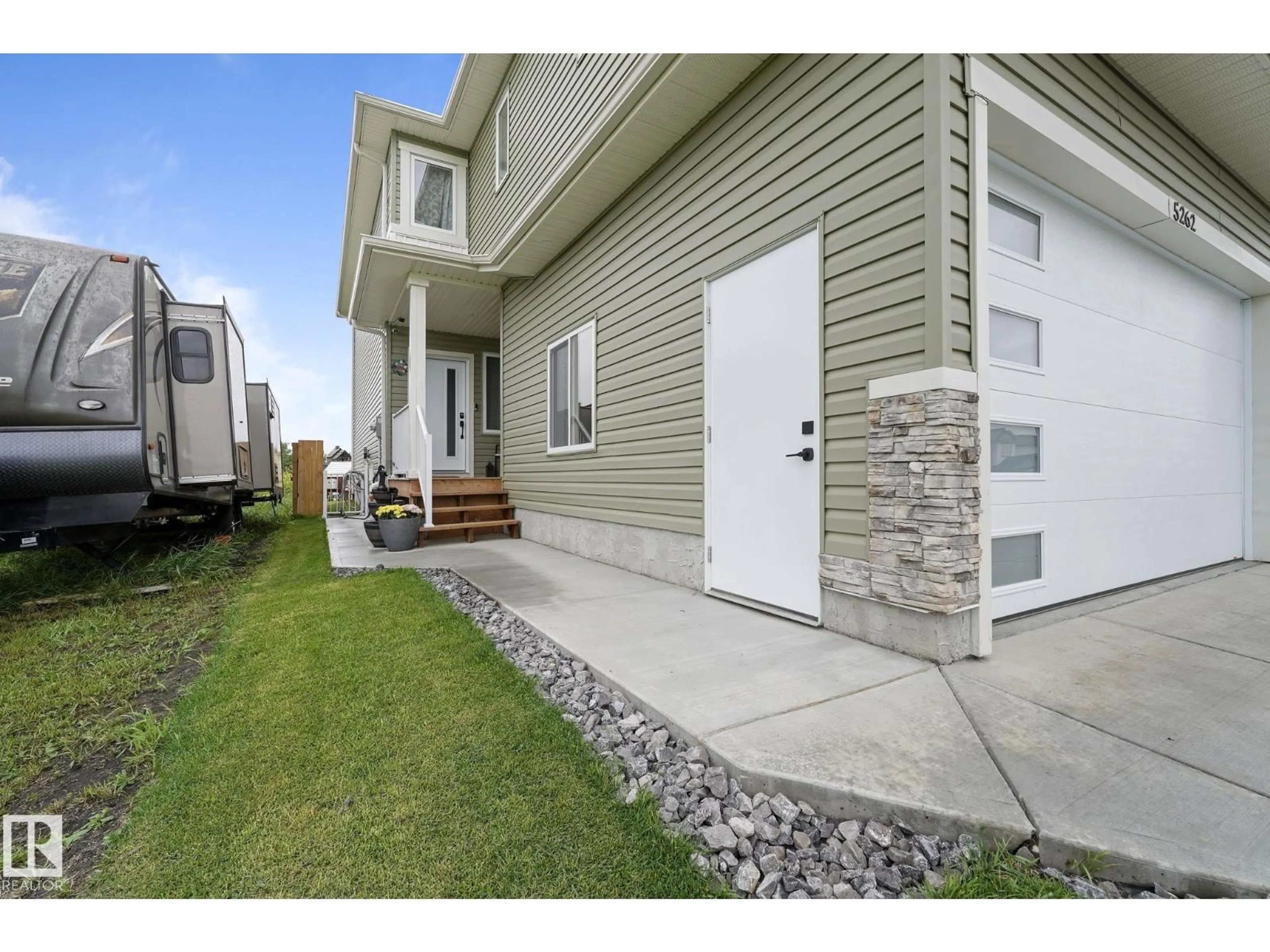 Home with vinyl exterior material, street for 5262 47 AV, Calmar Alberta T0C0V0